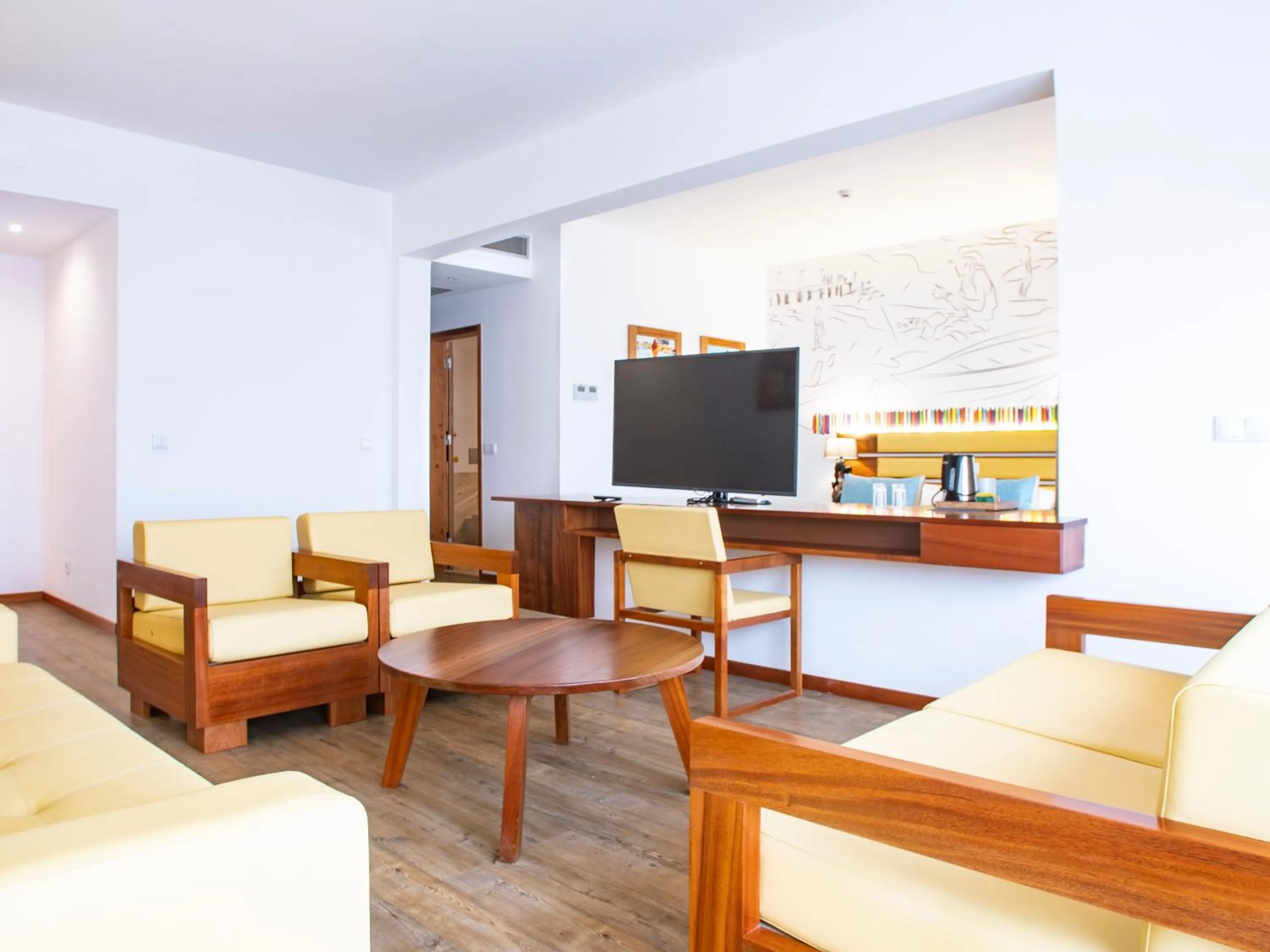 Communal lounge/ TV room in Hotel Odjo d'água