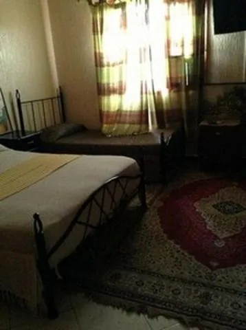 Photo of the whole room, Bed in Hôtel Tijani