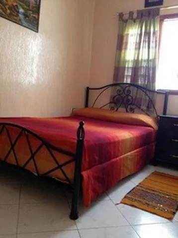 Photo of the whole room, Bed in Hôtel Tijani