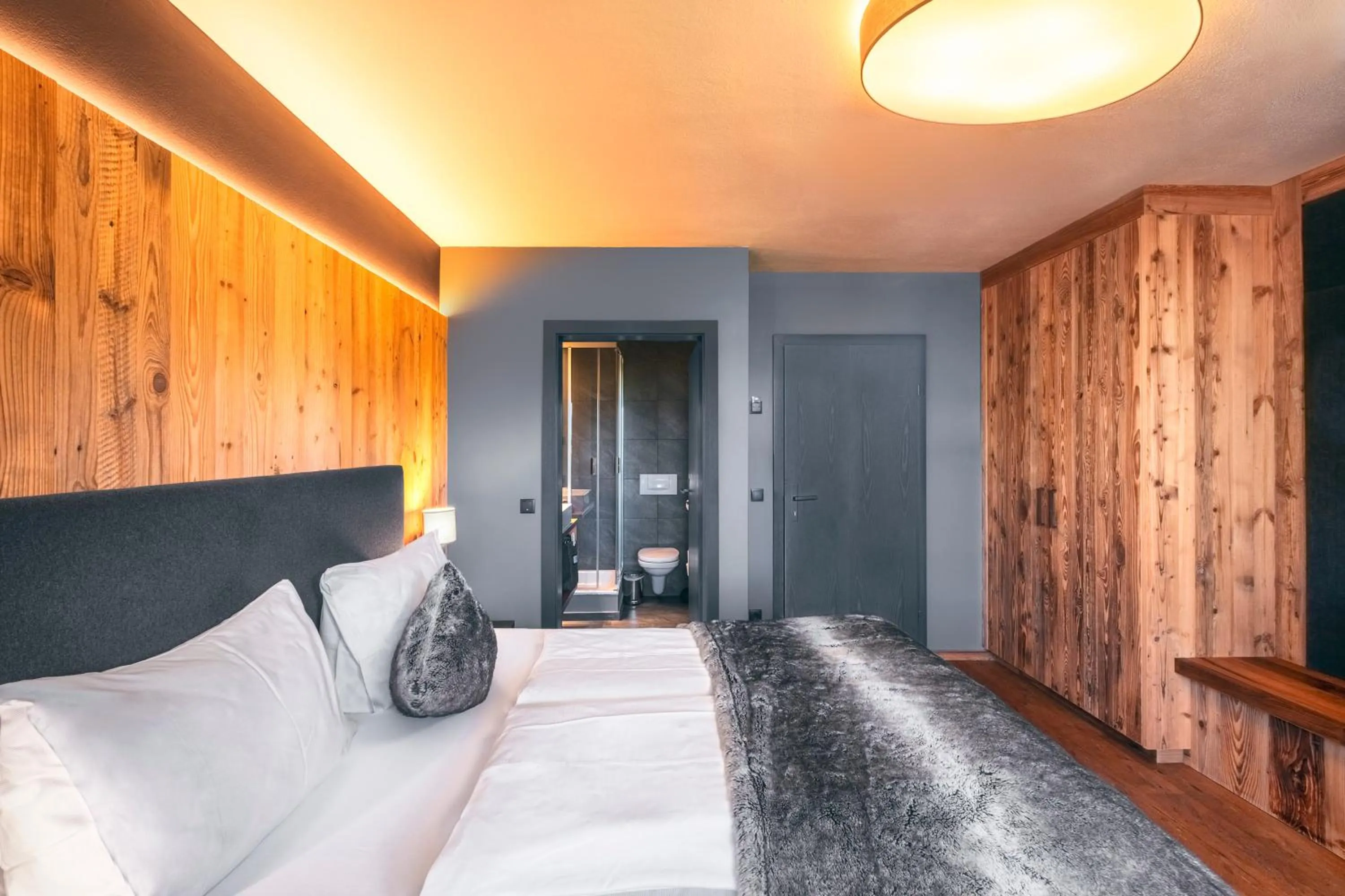 Bed in ALMMONTE SENSUM SUITES - Funky Living Hotel