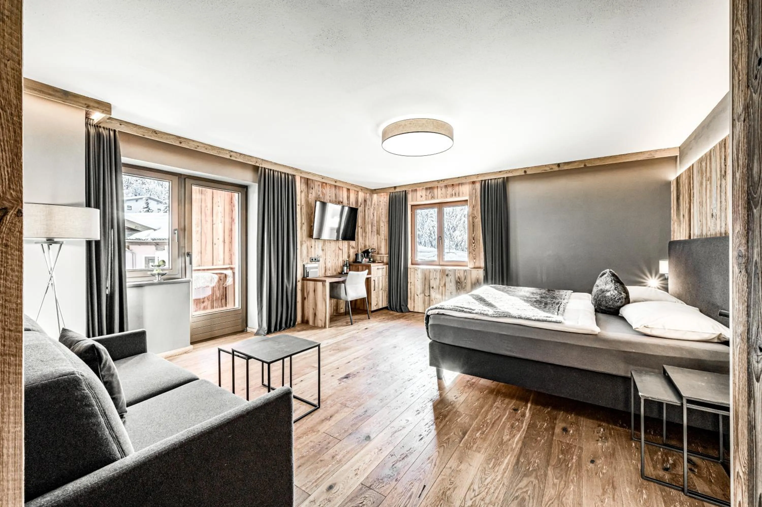 Photo of the whole room, Bed in ALMMONTE SENSUM SUITES - Funky Living Hotel