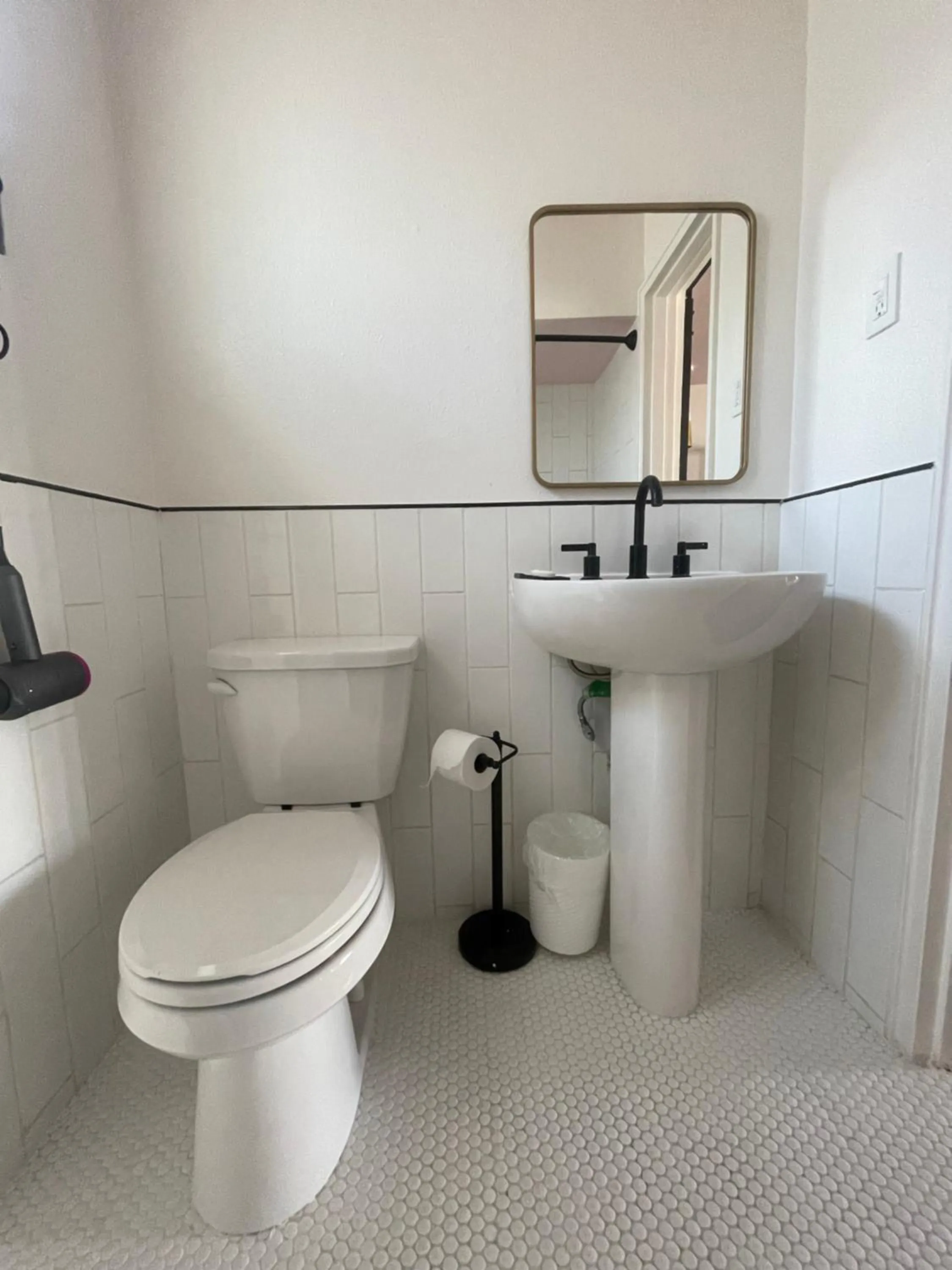 Toilet in Rainbow Motel