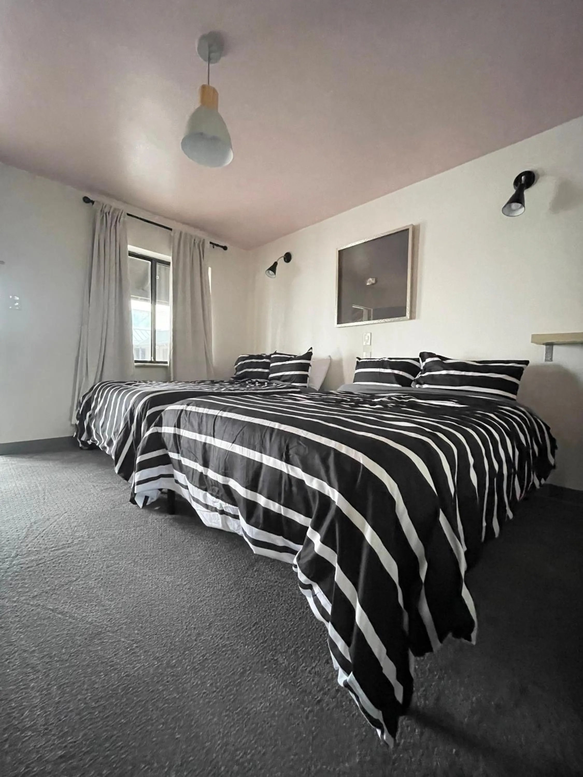 Bed in Rainbow Motel