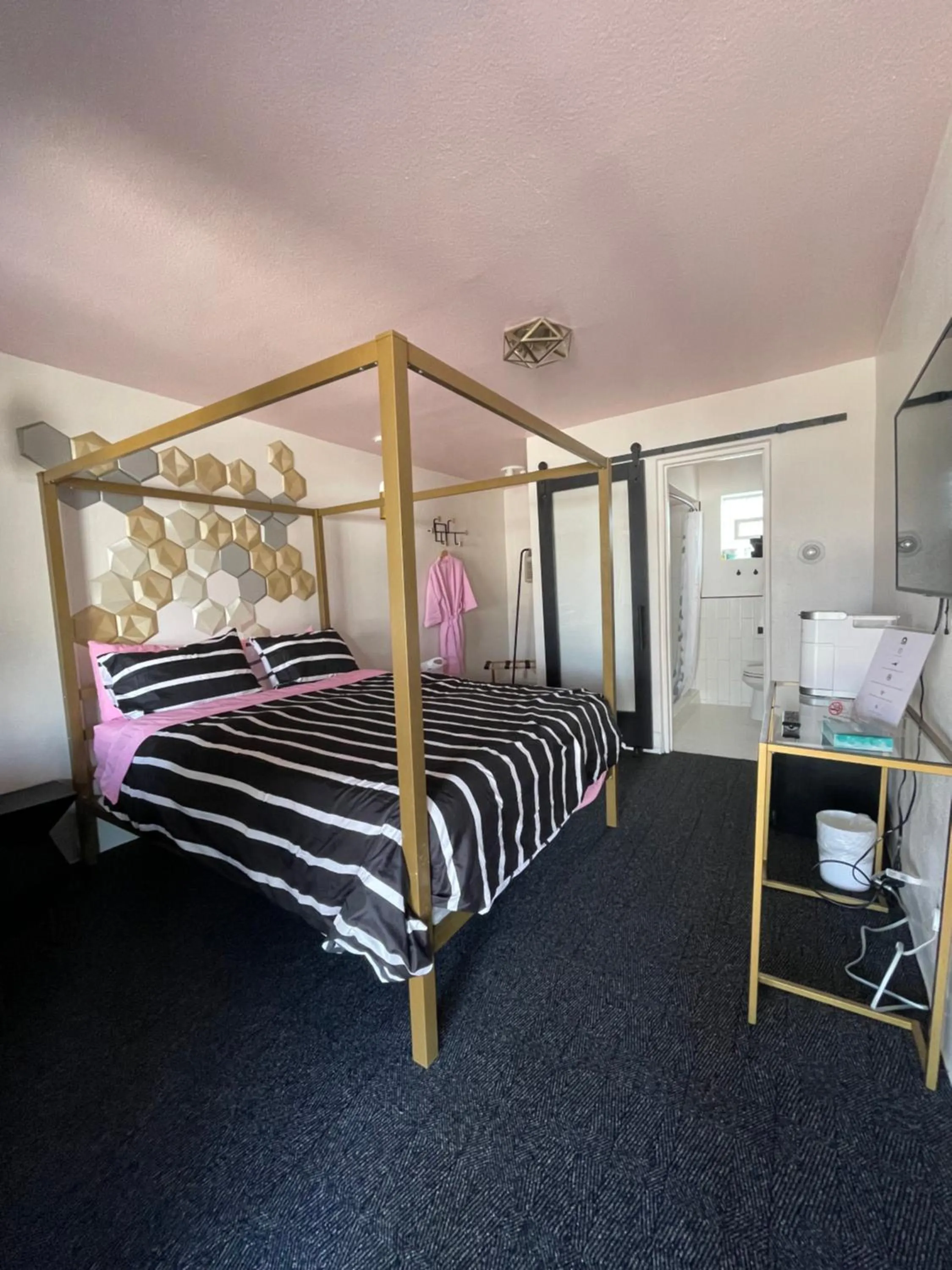 Bed in Rainbow Motel