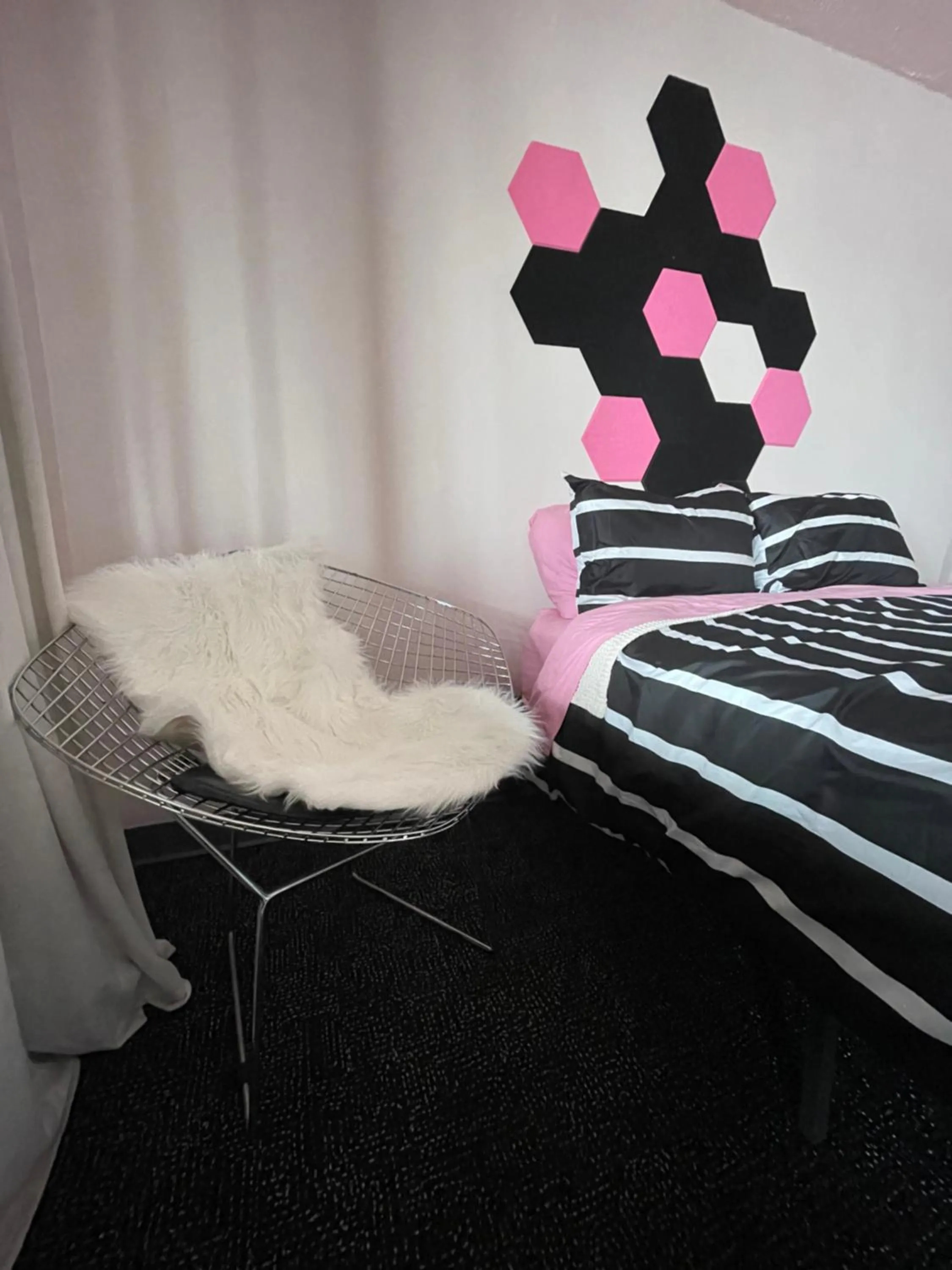 Bed in Rainbow Motel