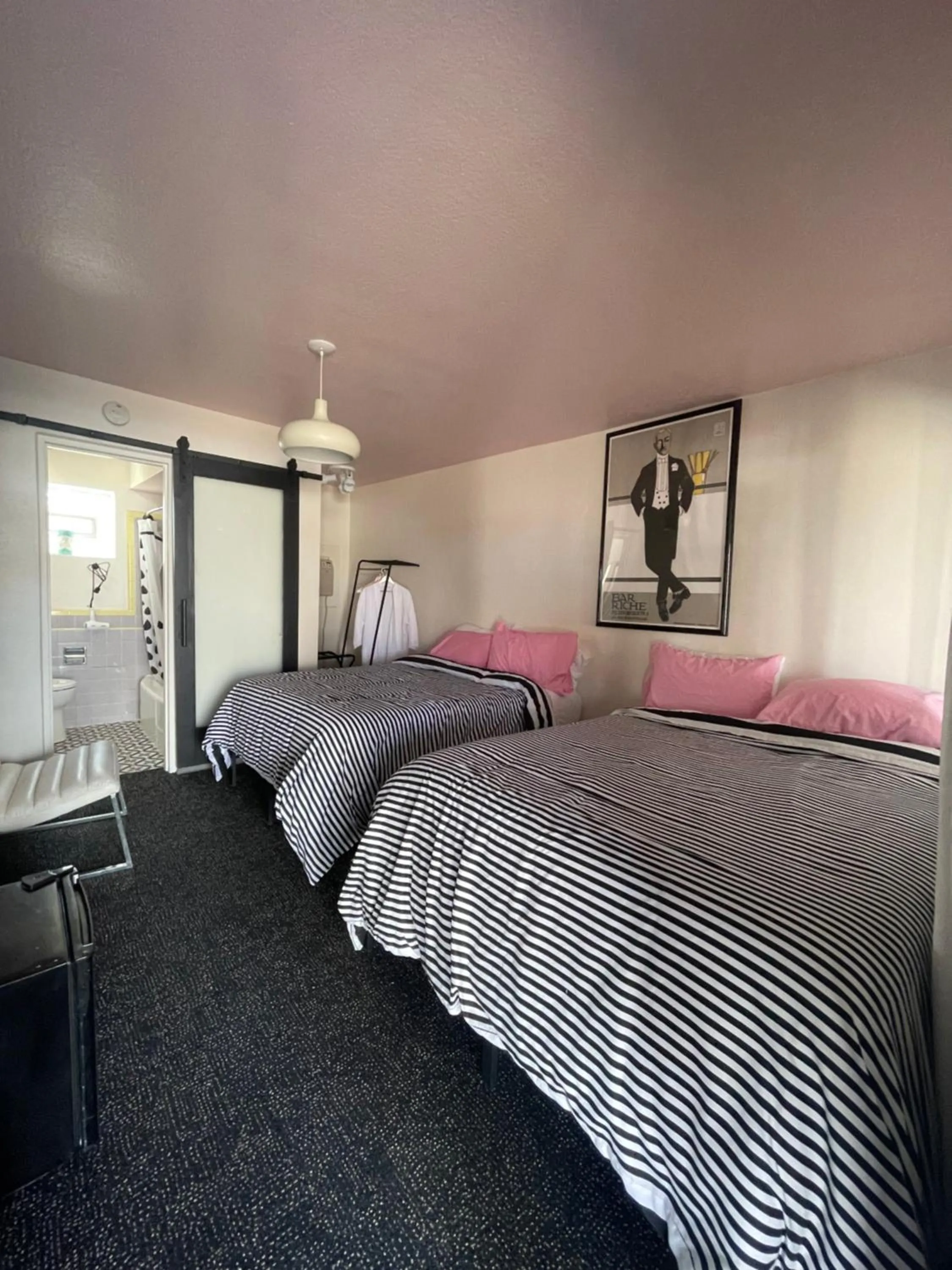 Bed in Rainbow Motel