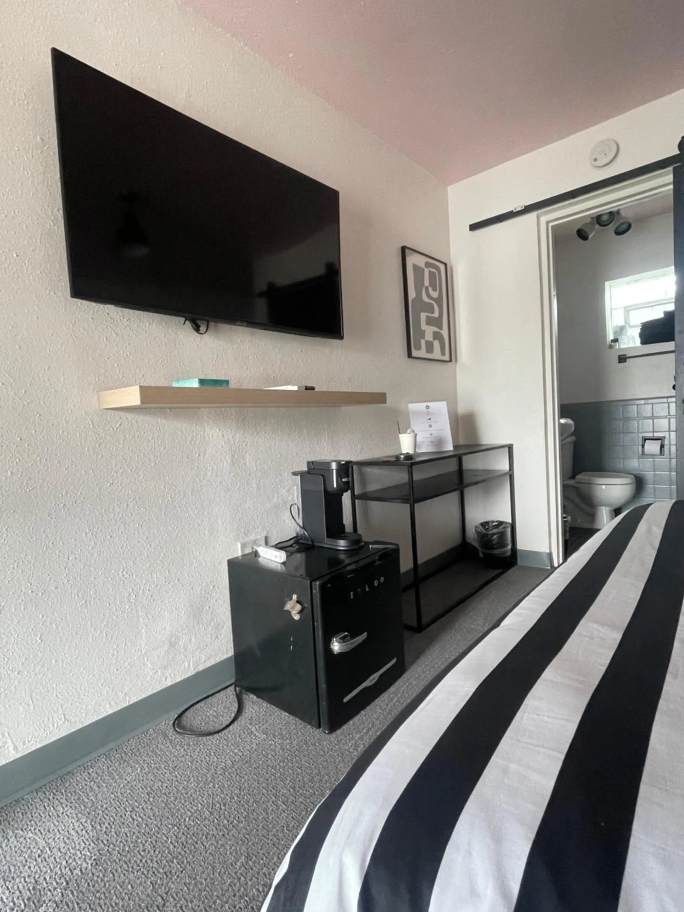 Bed in Rainbow Motel