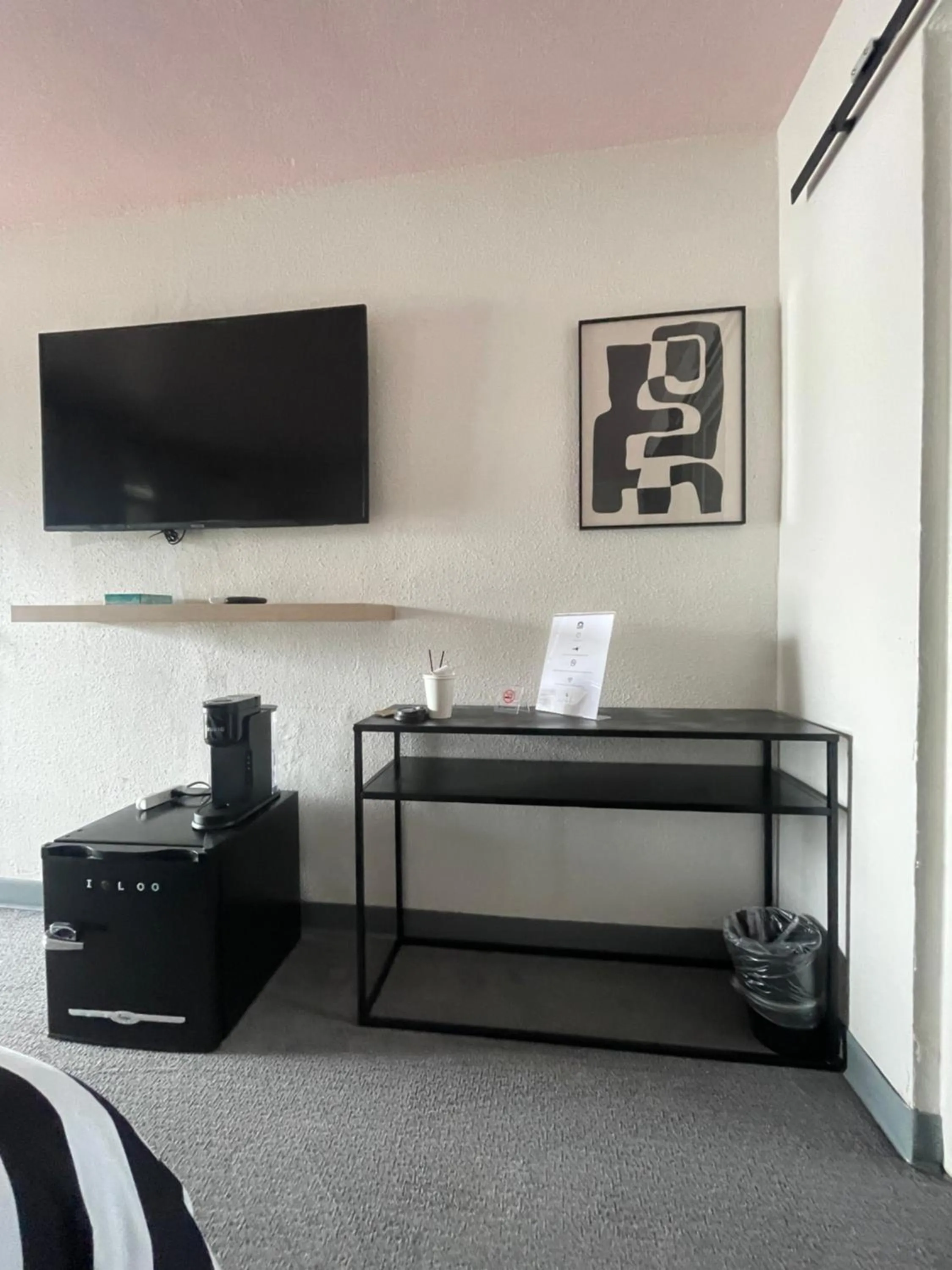 Bed in Rainbow Motel