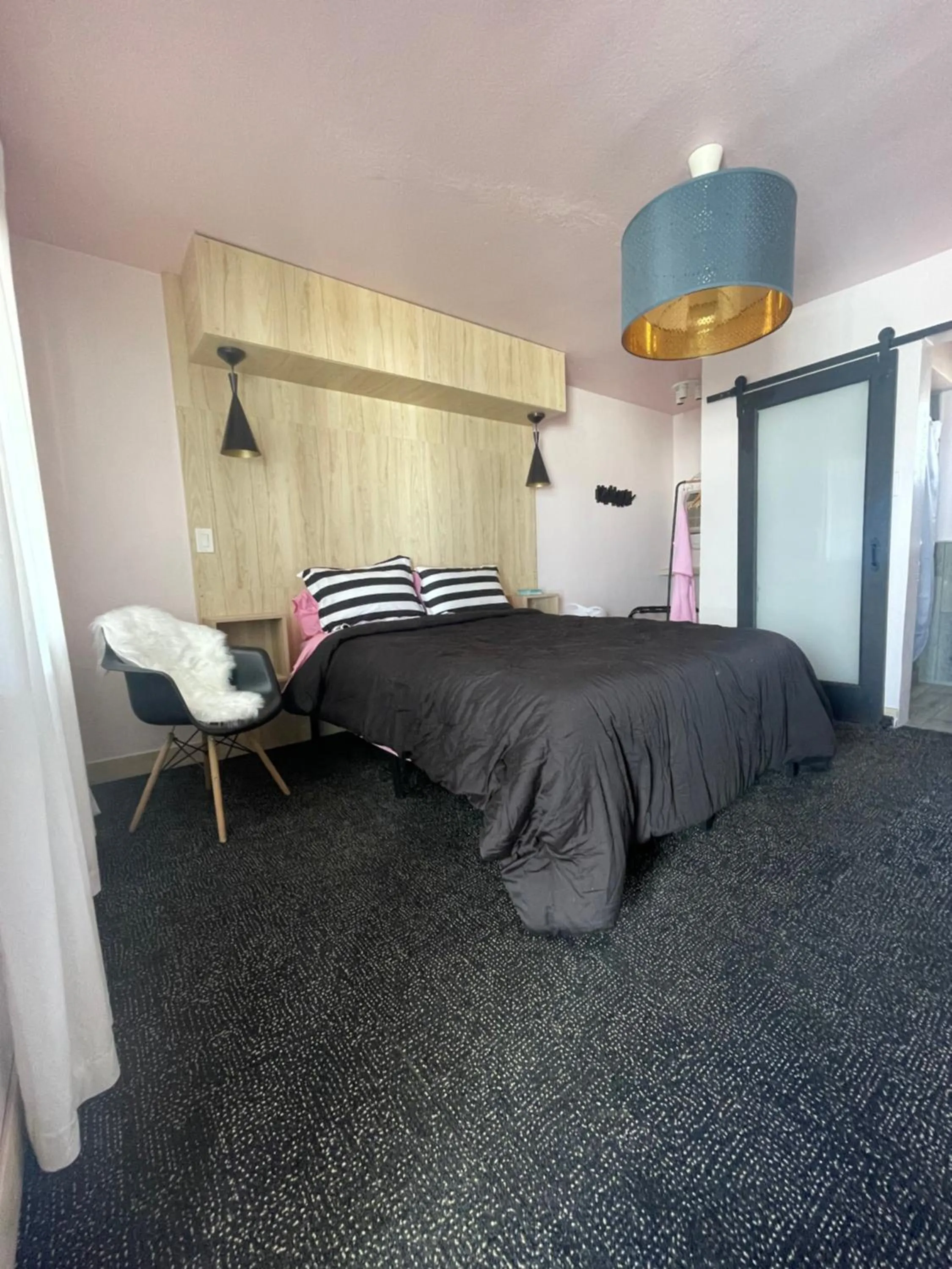 Bed in Rainbow Motel