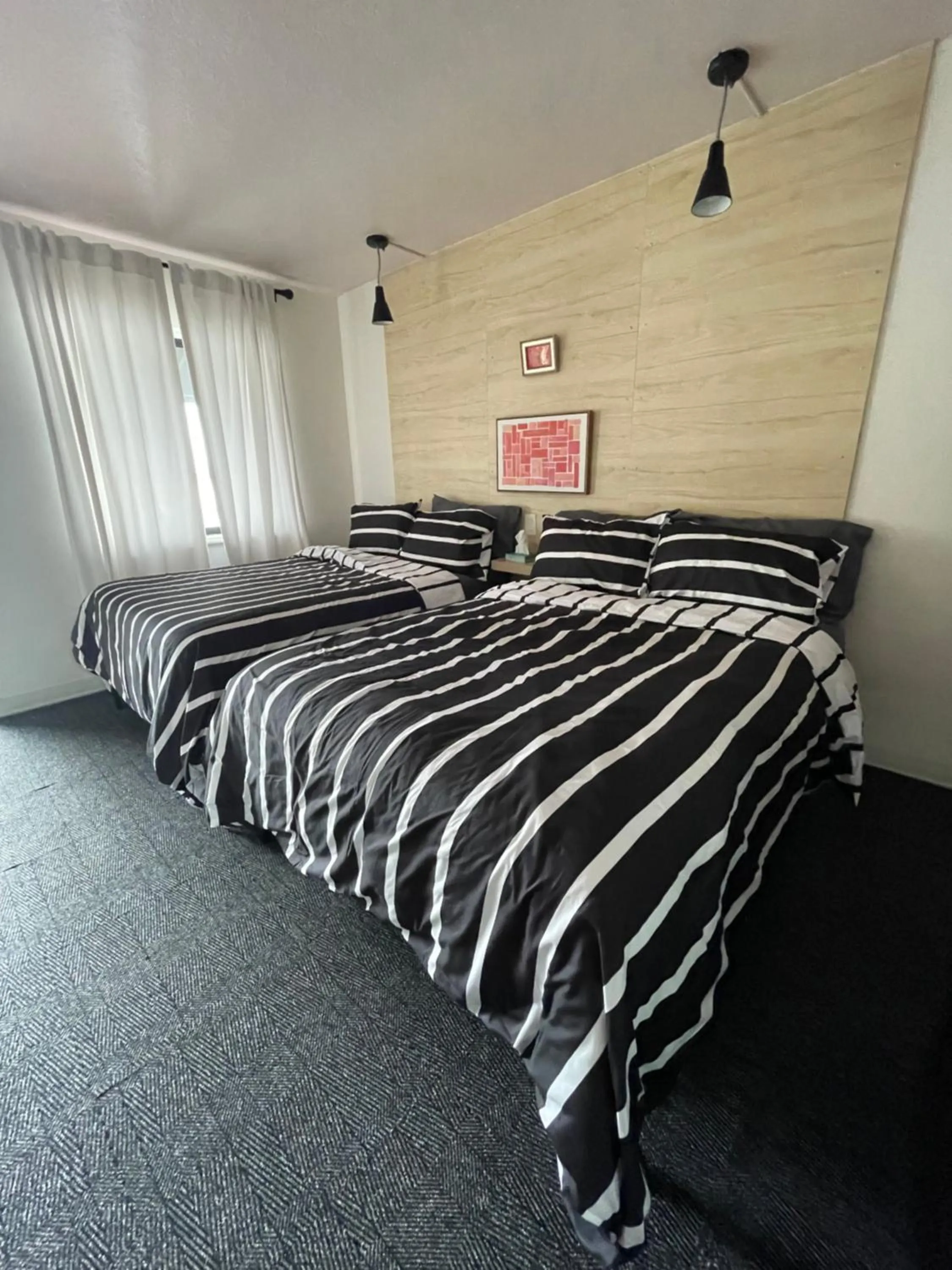 Bed in Rainbow Motel