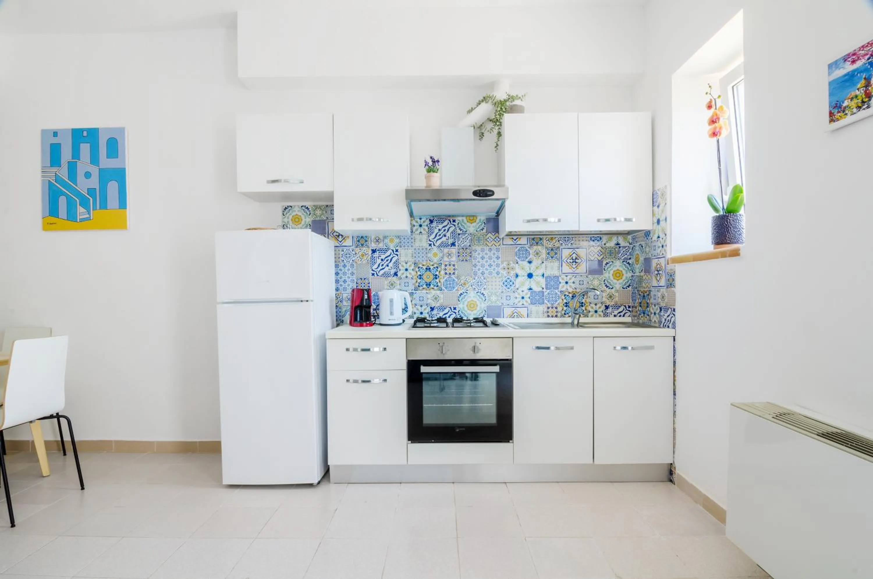 Kitchen or kitchenette in OraBlu Exclusive Villas