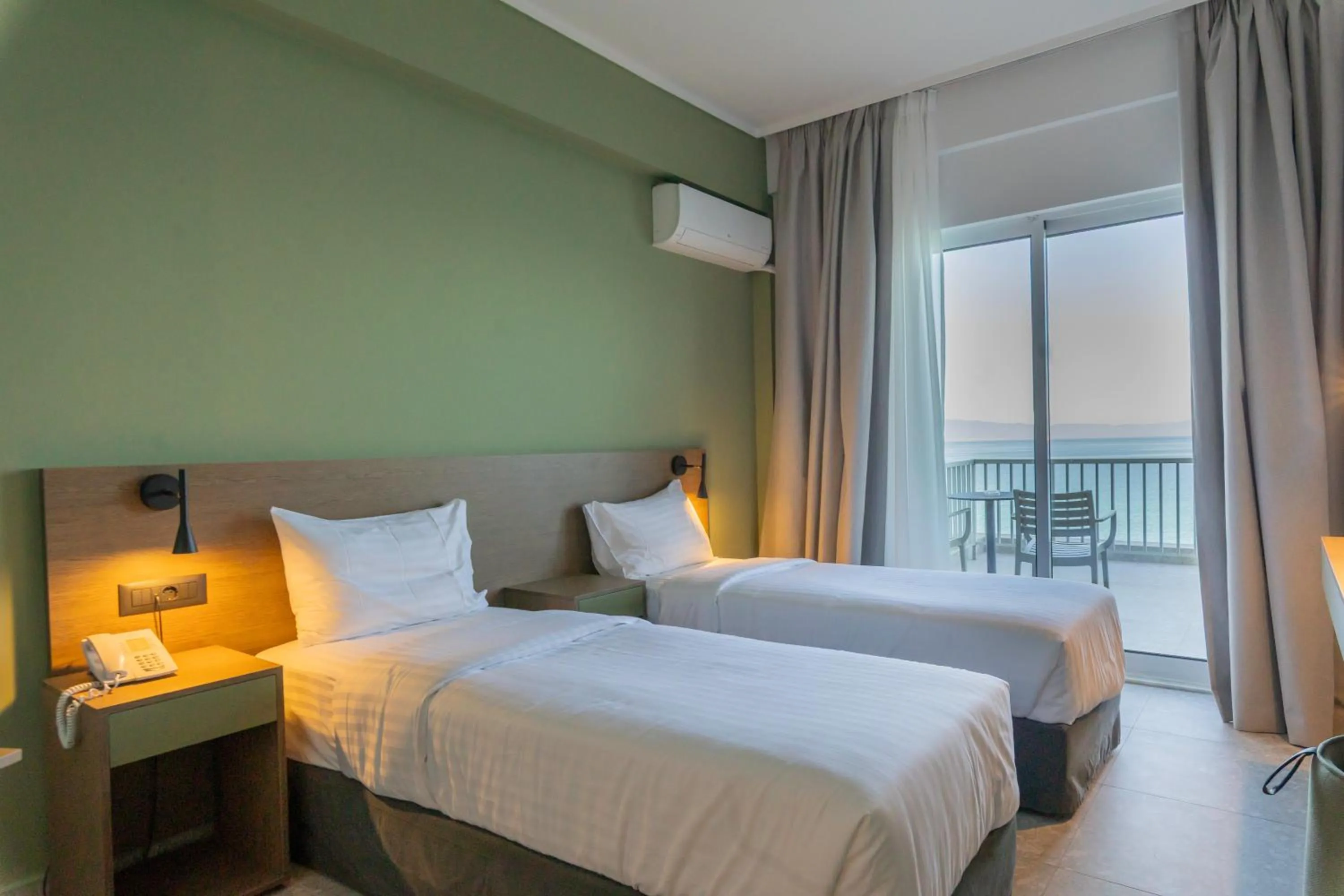 Photo of the whole room, Bed in Messinian Bay