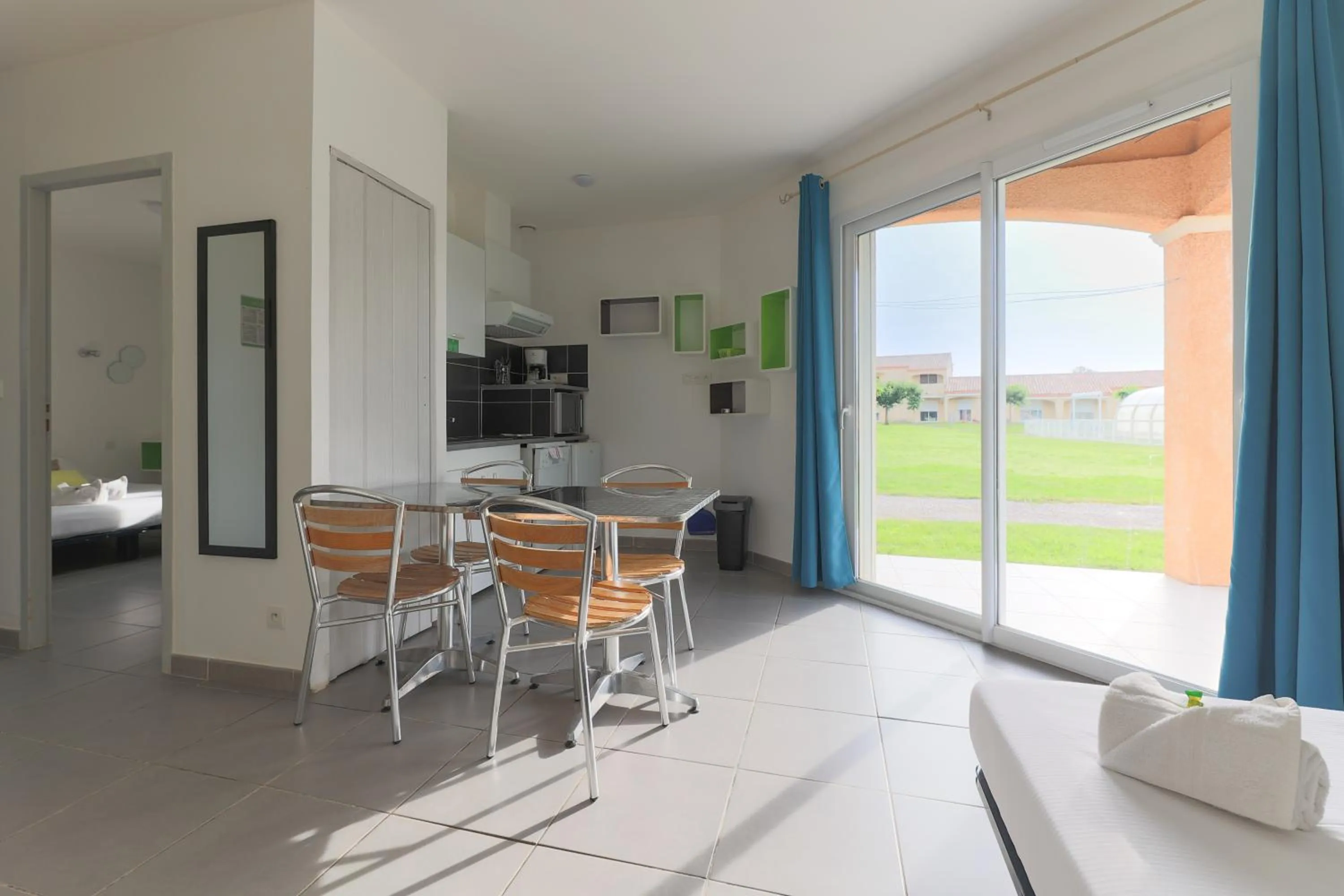 Kitchen or kitchenette in Park & Suites Village Gorges de l'Hérault-Cévennes