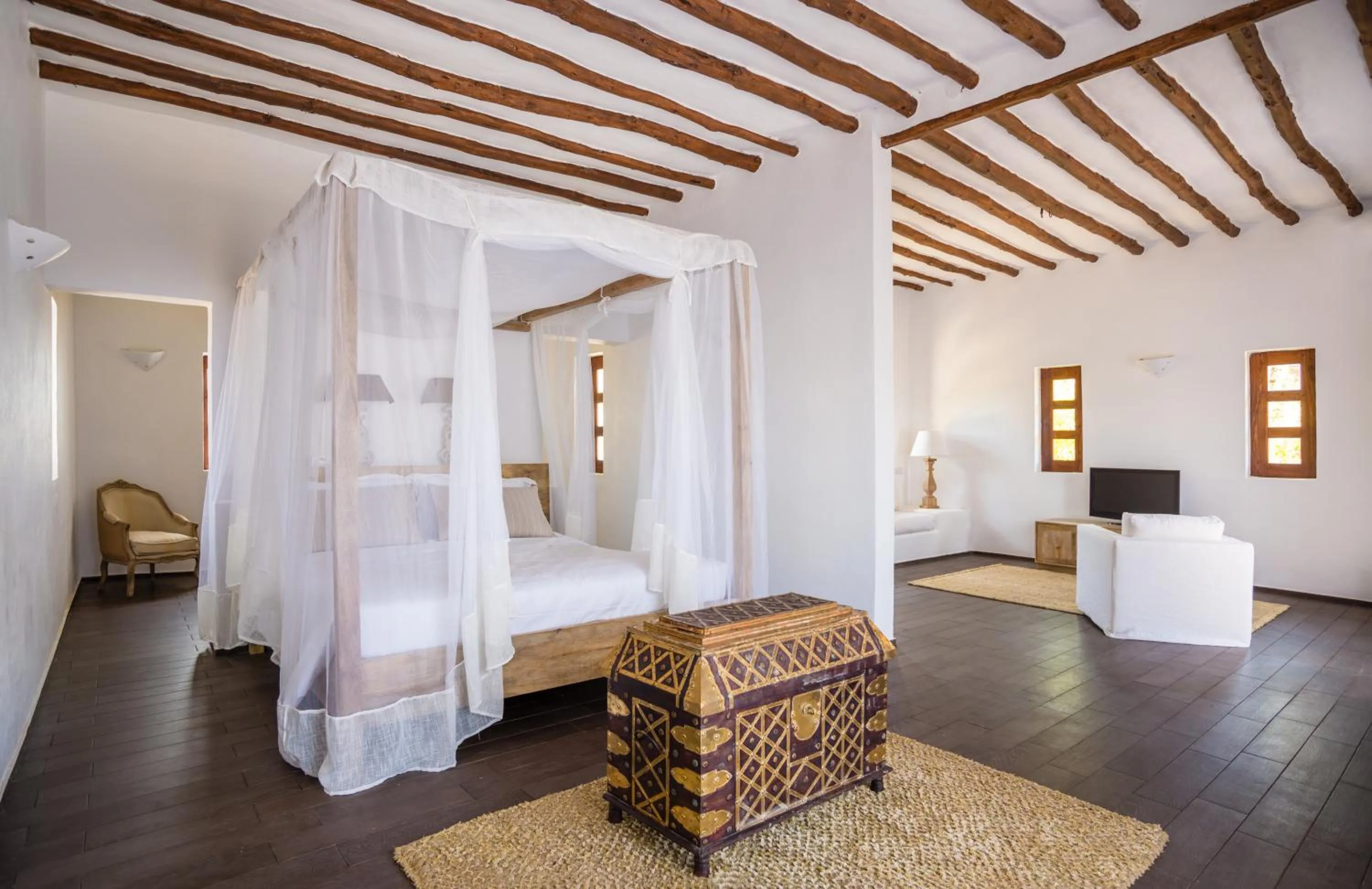 Bed in Konokono Beach Resort and Isaraya Luxury Overwater Villas