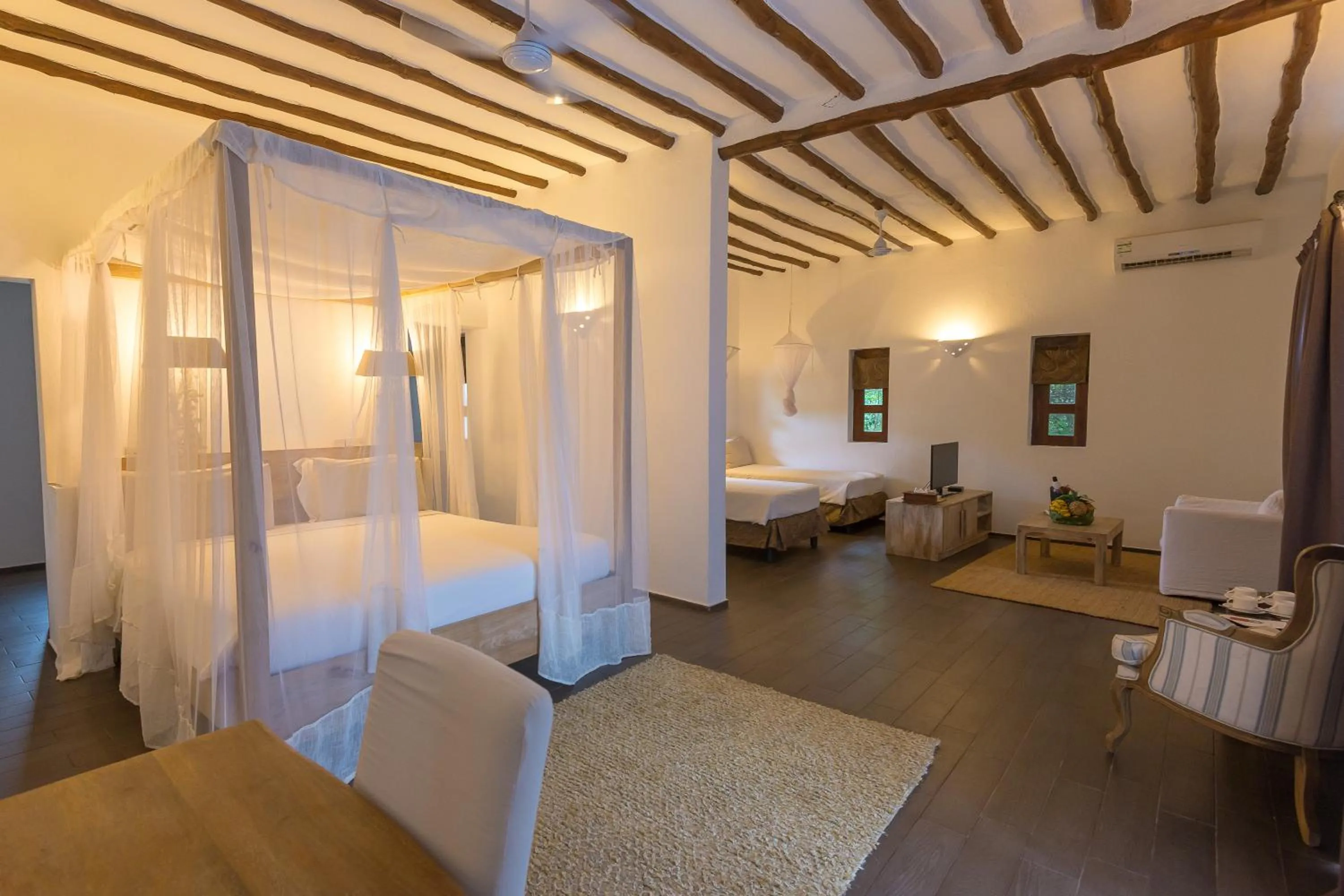 Photo of the whole room, Bed in Konokono Beach Resort and Isaraya Luxury Overwater Villas