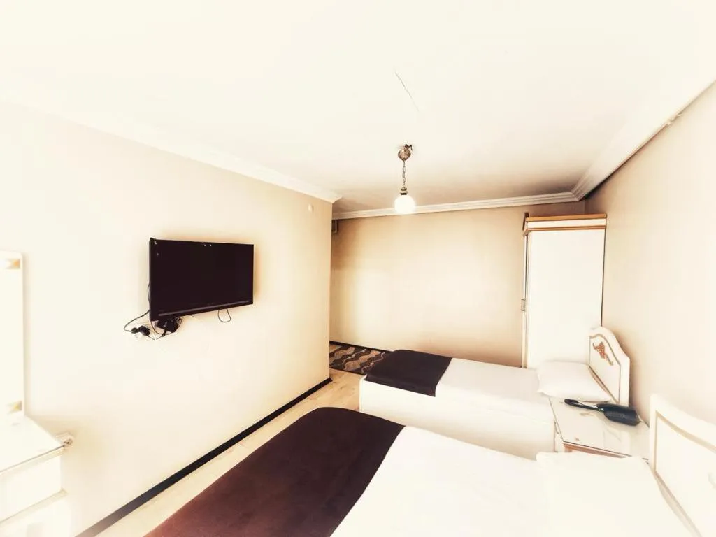 Photo of the whole room, Bed in Seref Hotel