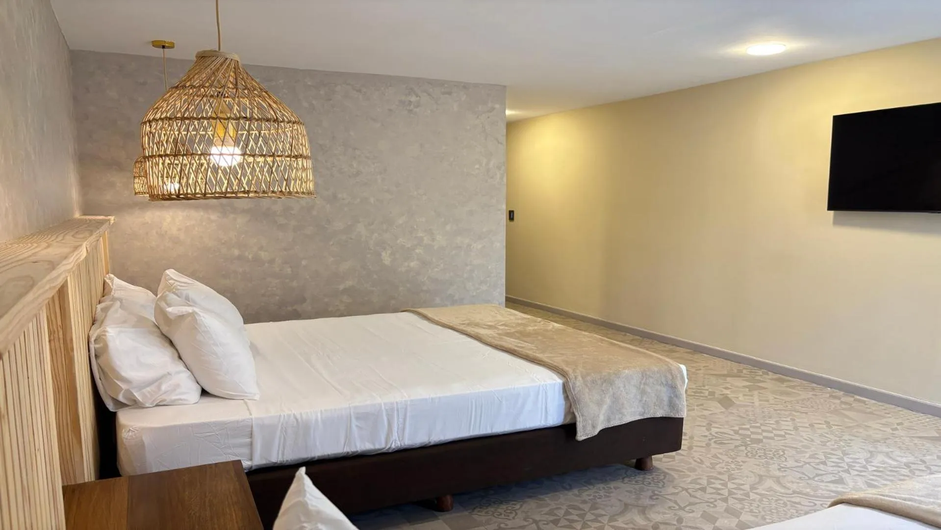 Bed in Hotel Blue Cove by On vacation