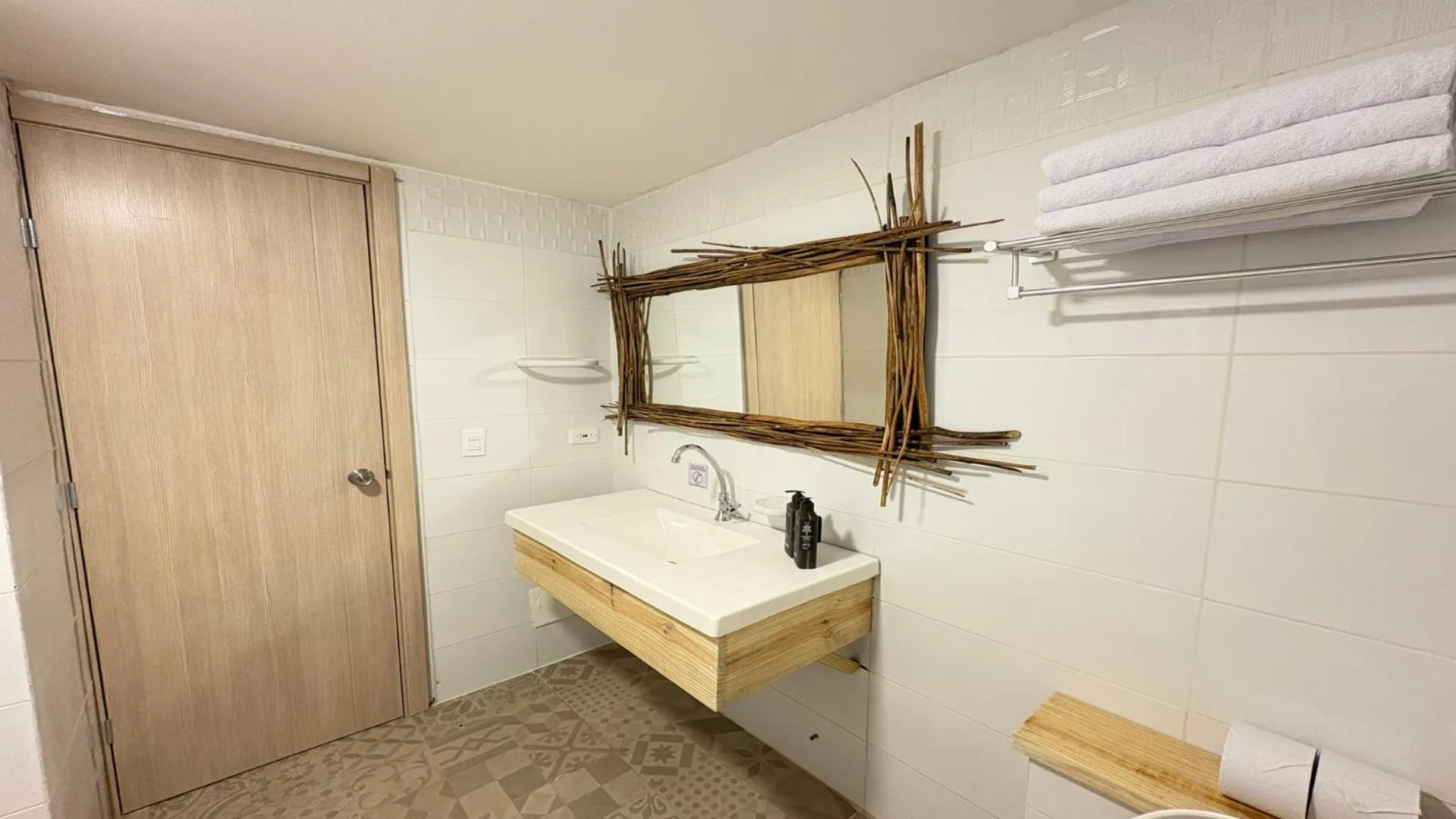 Bathroom in Hotel Blue Cove by On vacation