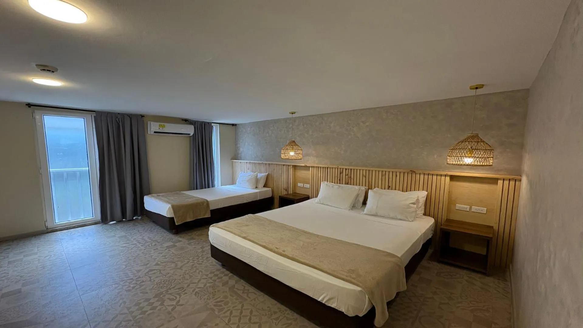 Bed in Hotel Blue Cove by On vacation