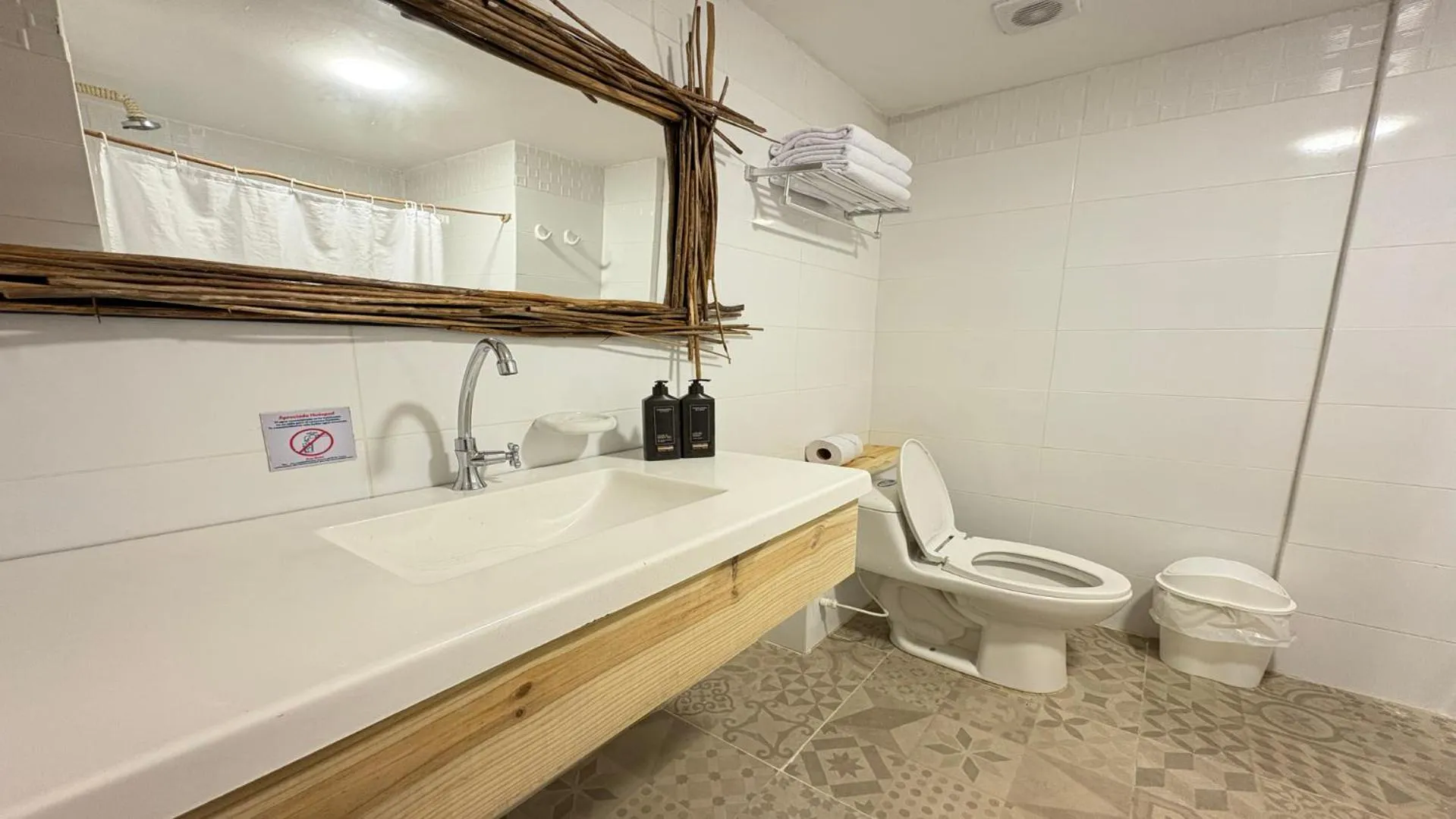 Bathroom in Hotel Blue Cove by On vacation