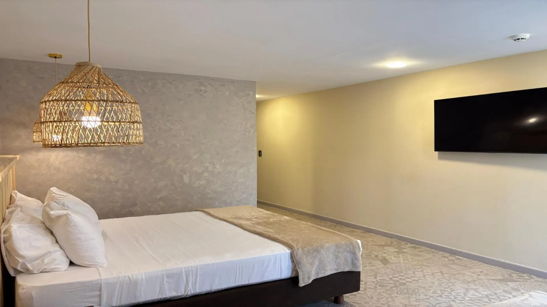 Bed in Hotel Blue Cove by On vacation