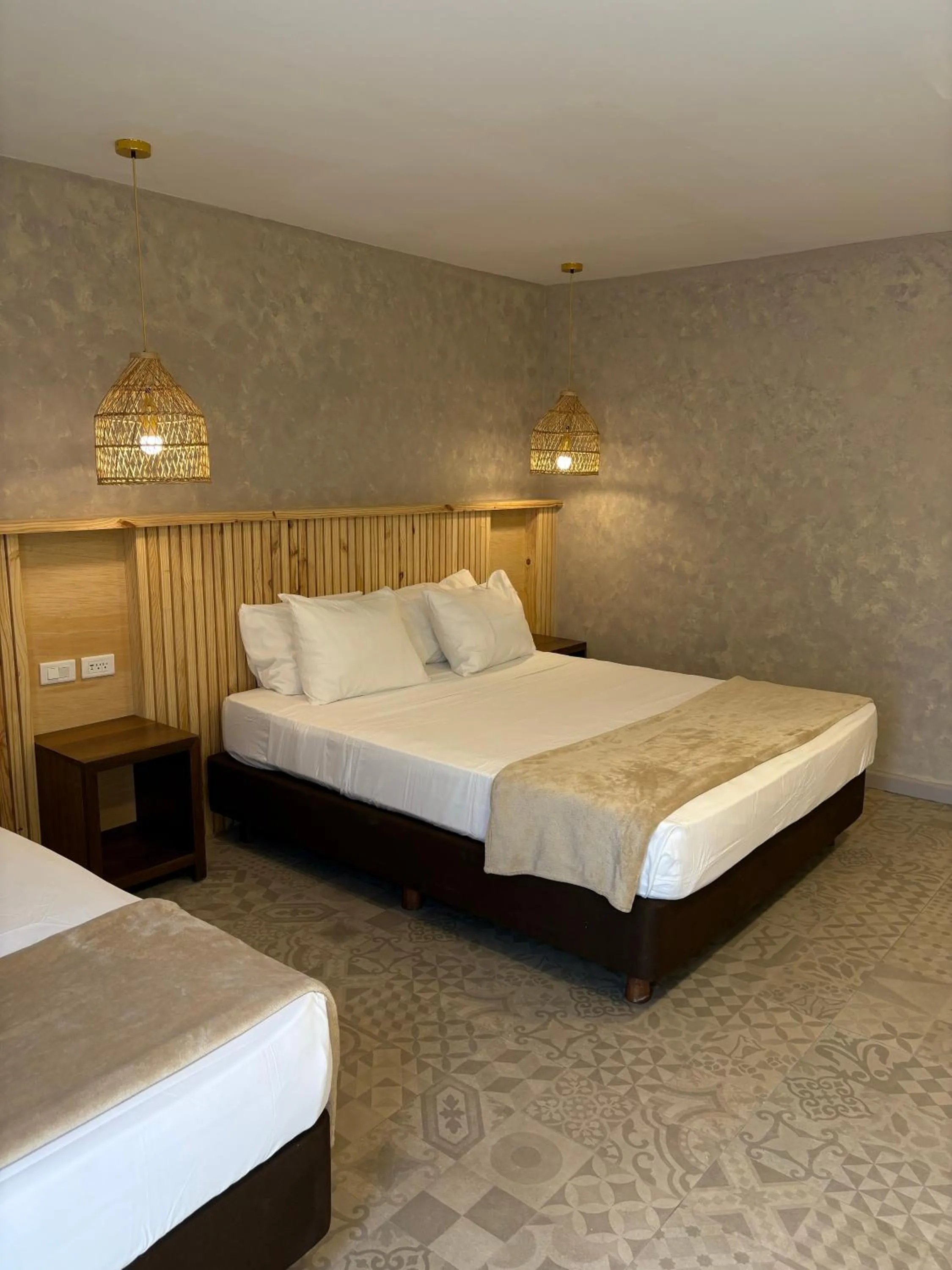 Bed in Hotel Blue Cove by On vacation