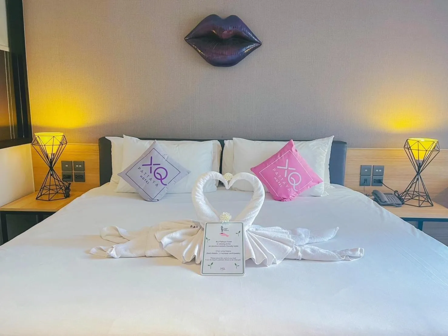 Bed in XQ Pattaya Hotel