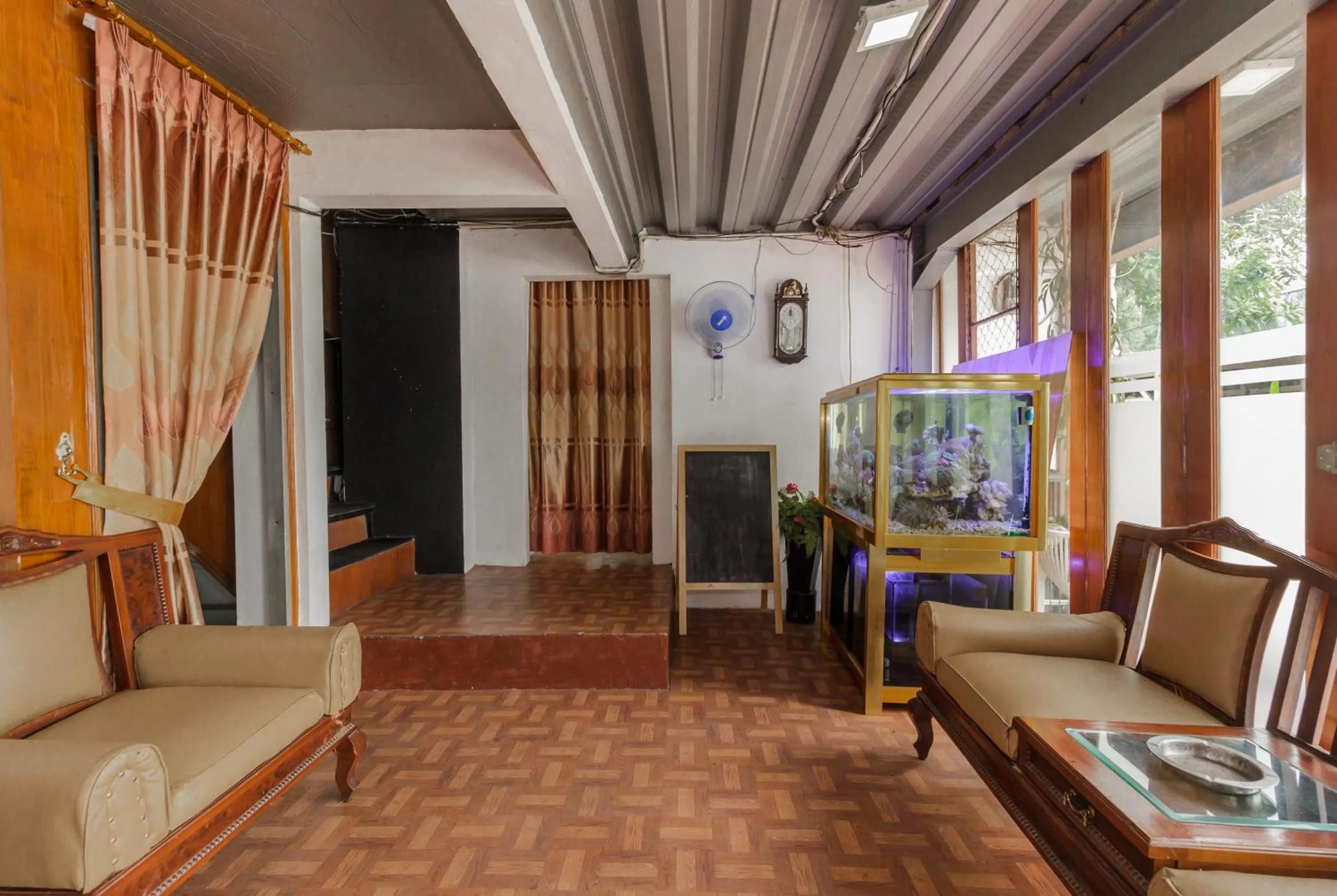 Living room in RedDoorz Syariah At Taman Bendungan Asahan