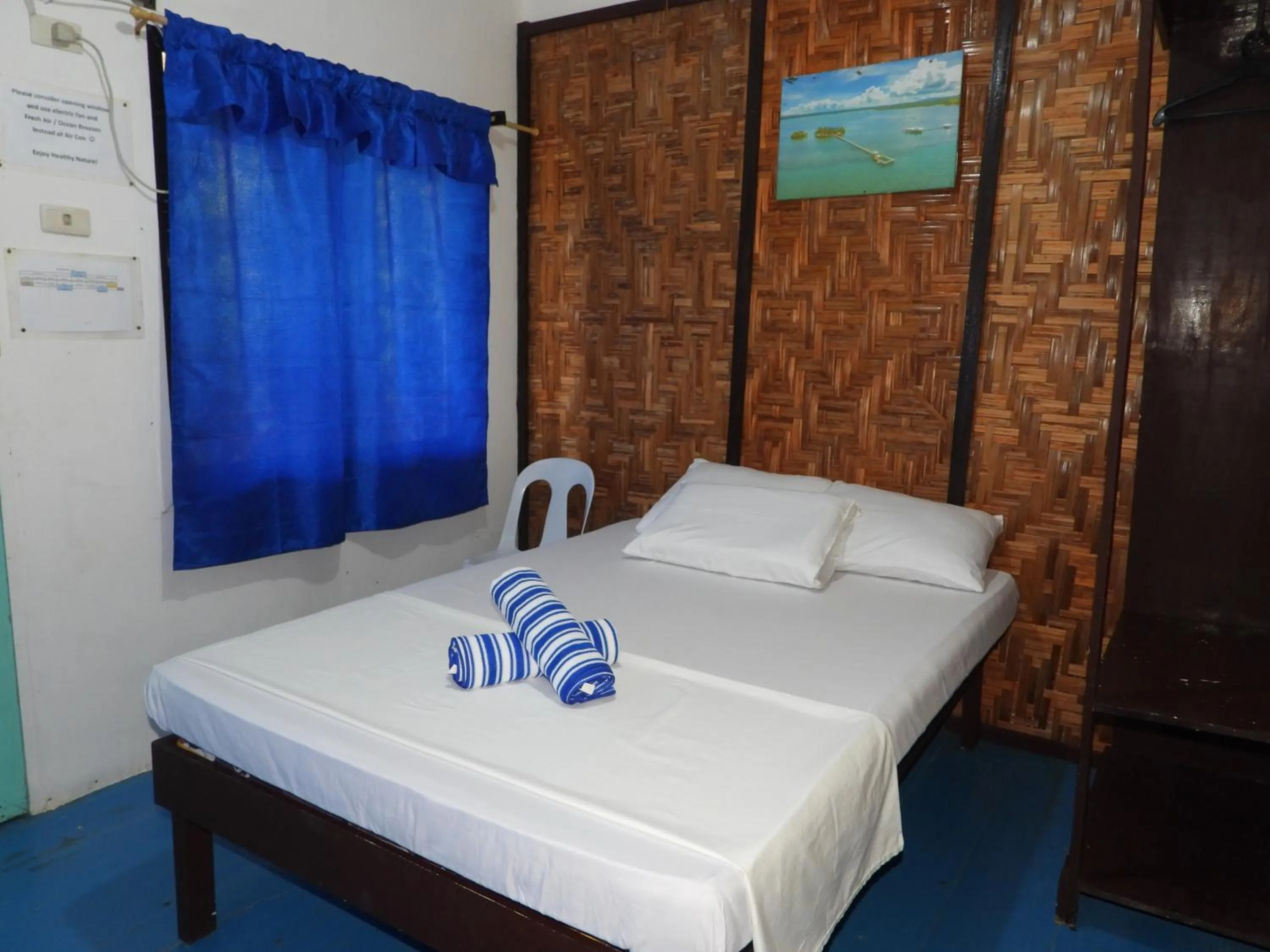 Bed in Enchanted River Rock Island Resort