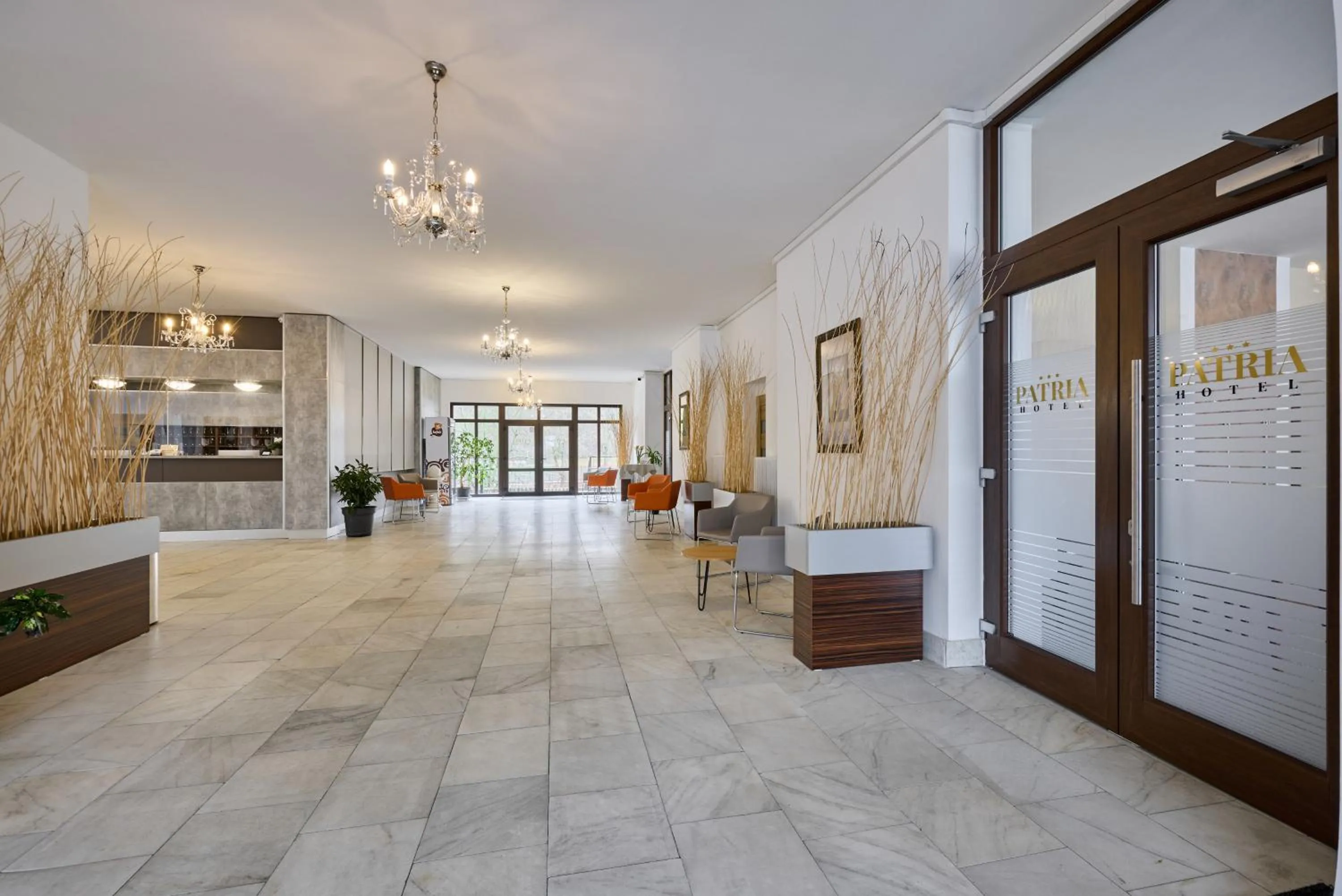 Lobby or reception in PATRIA HOTEL