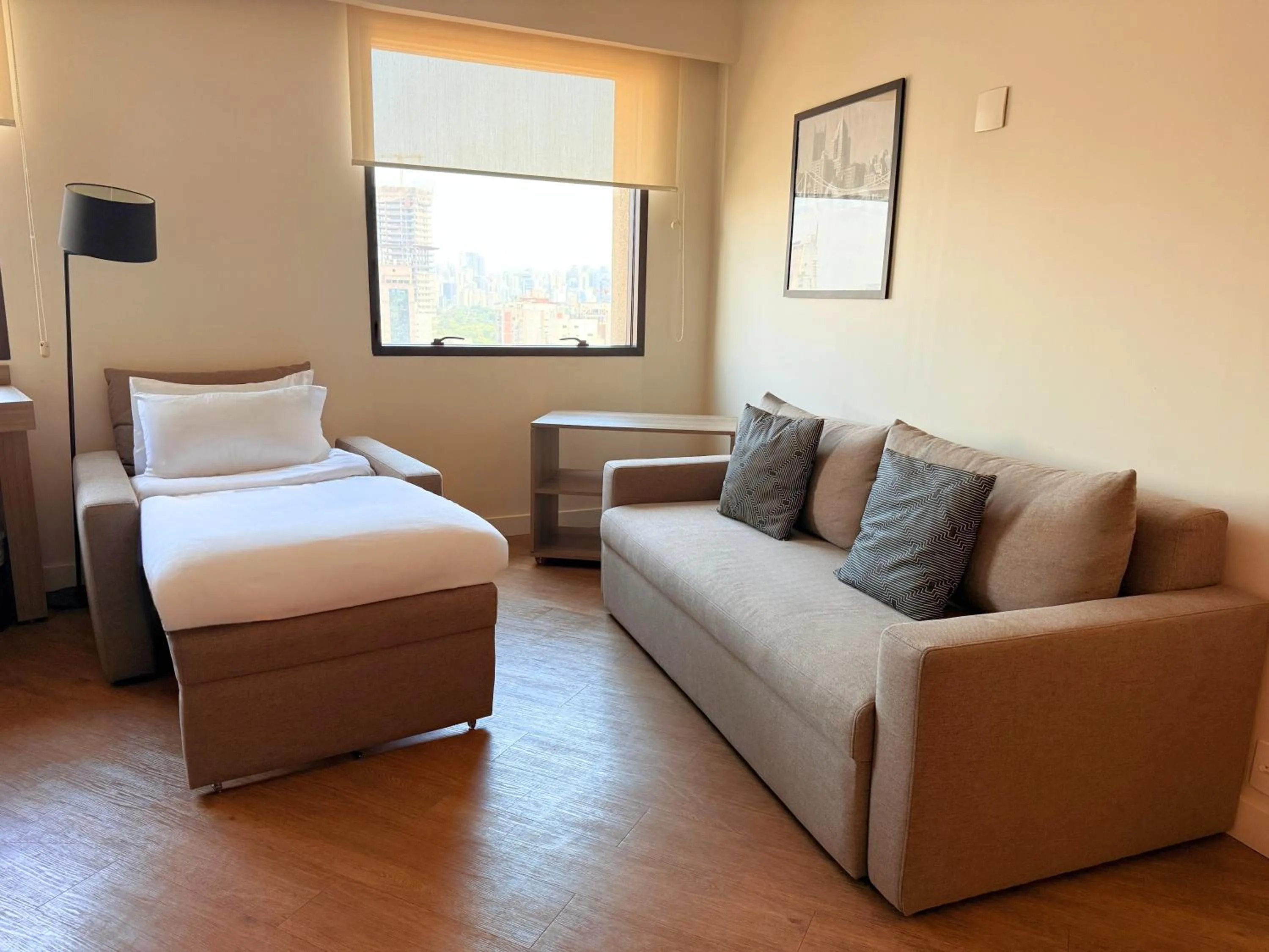 Living room, Bed in Staybridge Suites São Paulo by IHG