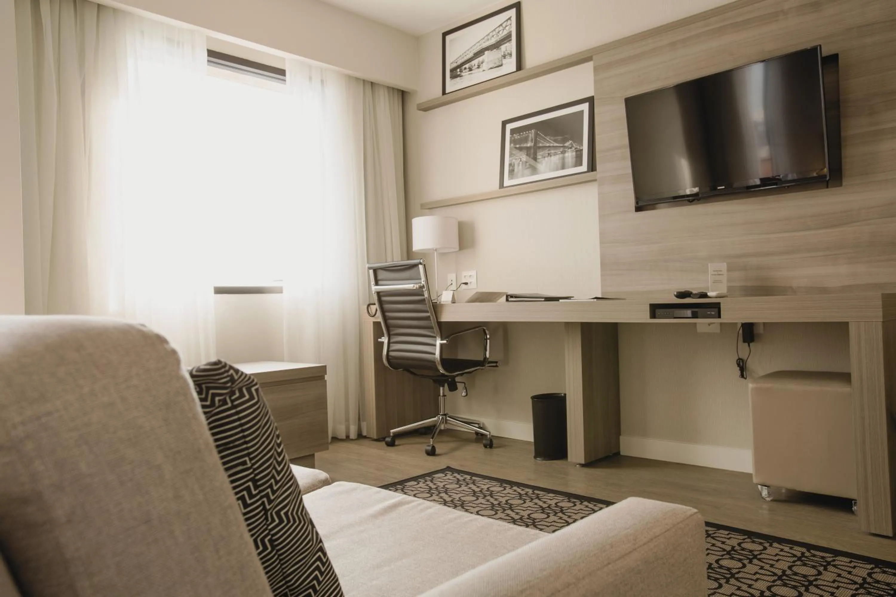 Seating area in Staybridge Suites São Paulo by IHG