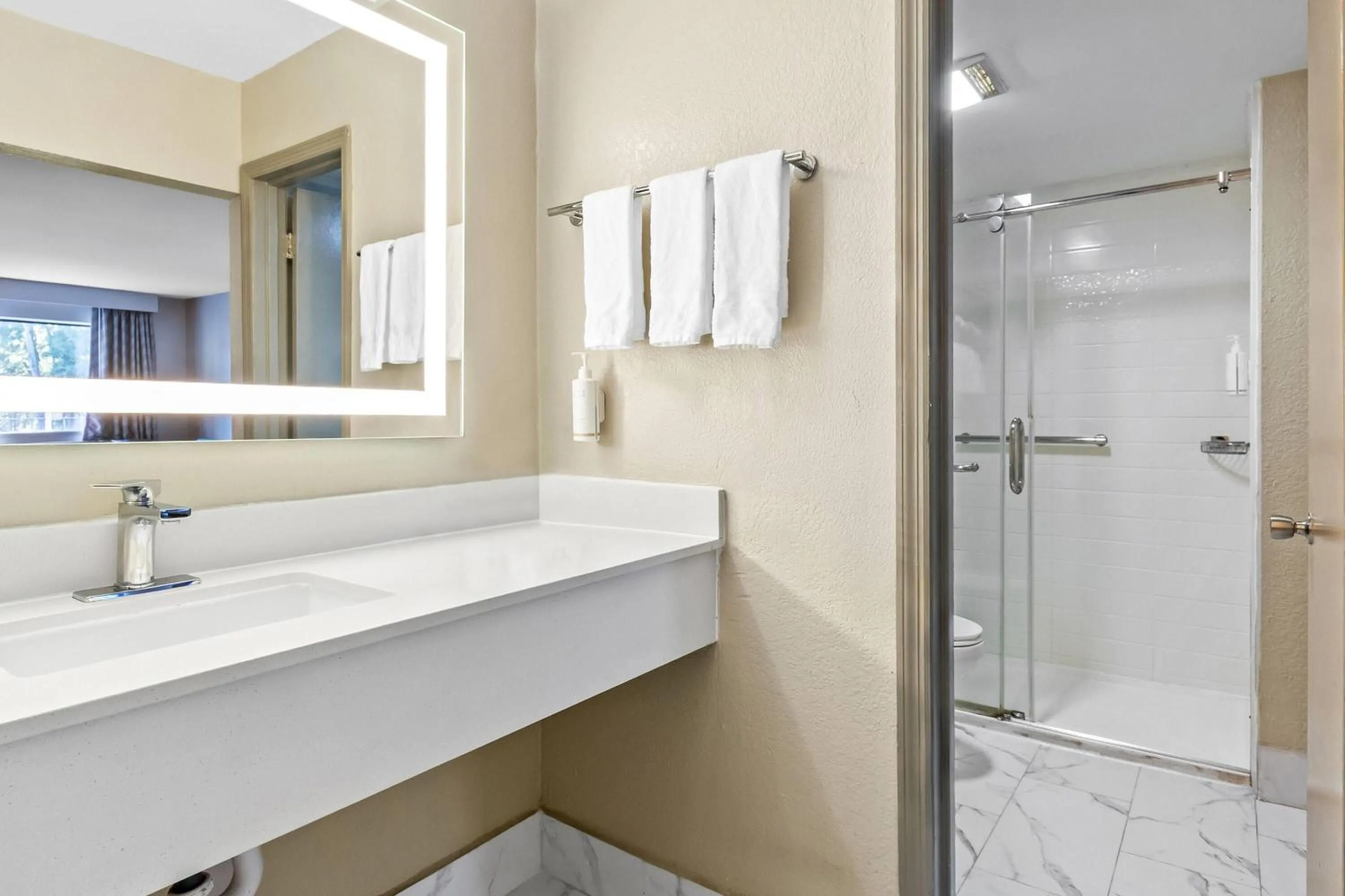 Bathroom in Days Inn by Wyndham Goose Creek