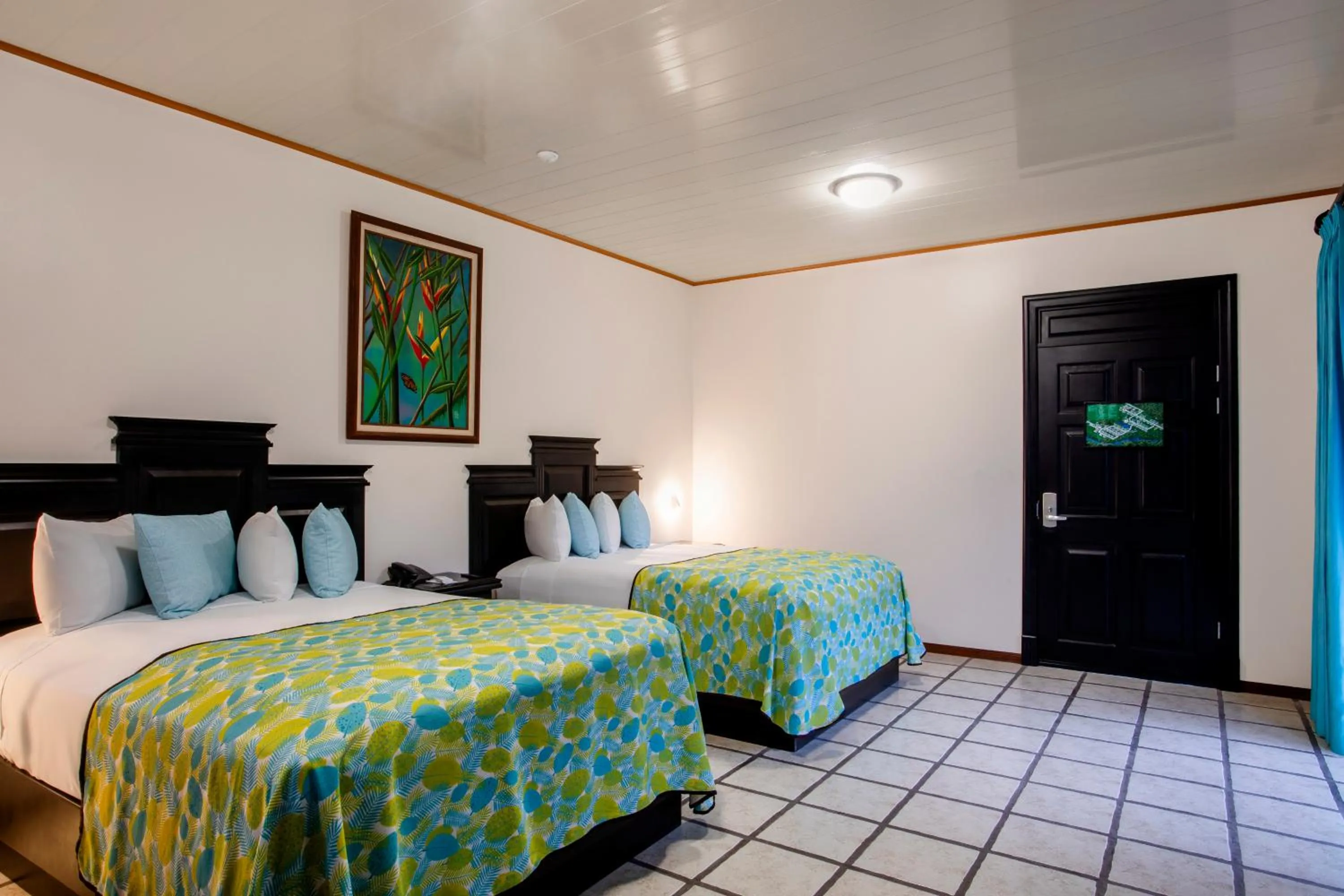 Photo of the whole room, Bed in Arenal Manoa Resort & Hot Springs