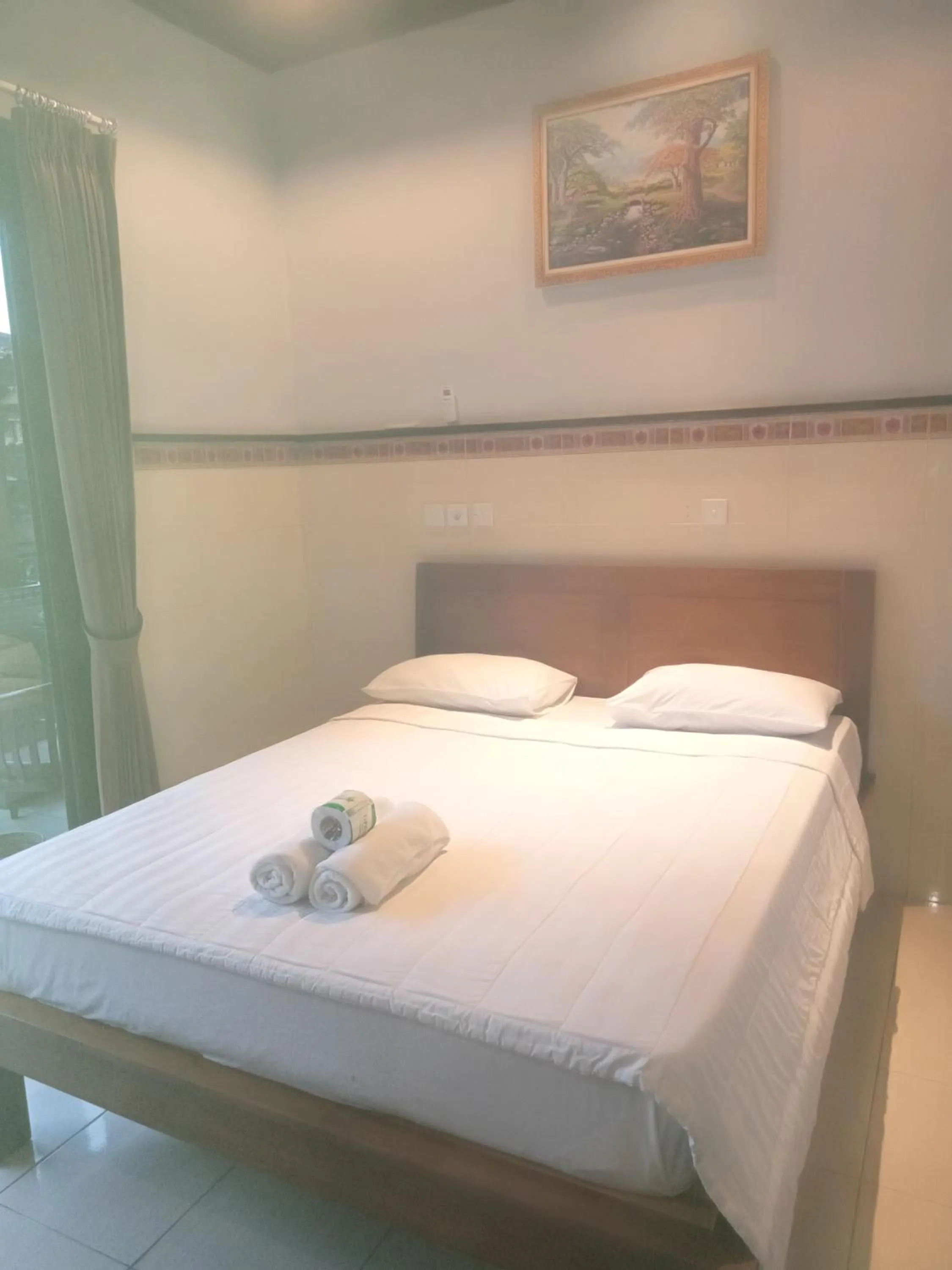 Bed in Dewi Antara Homestay