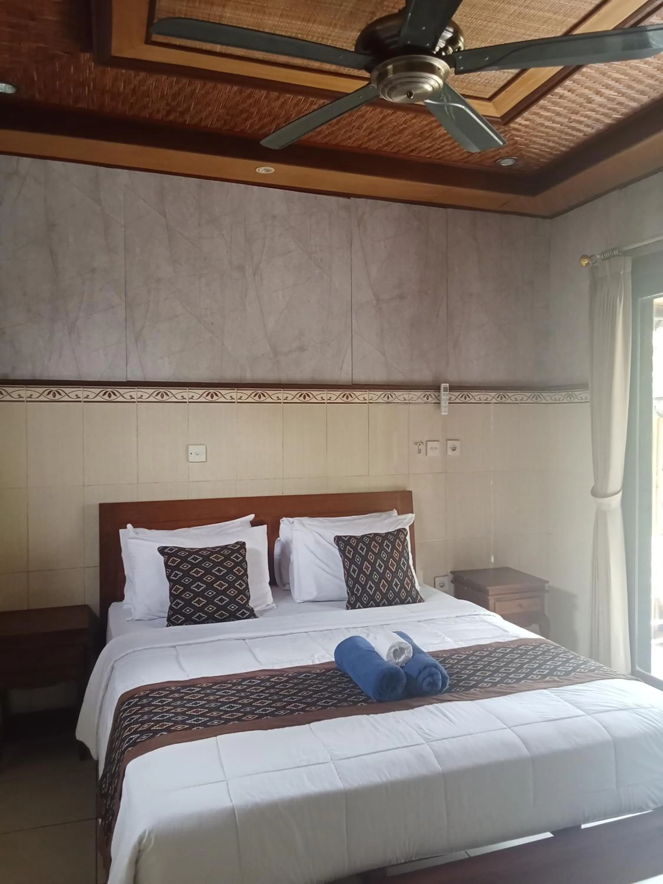 Bed in Dewi Antara Homestay