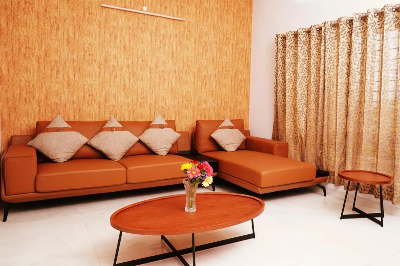 Living room in UNNATHI SUITES