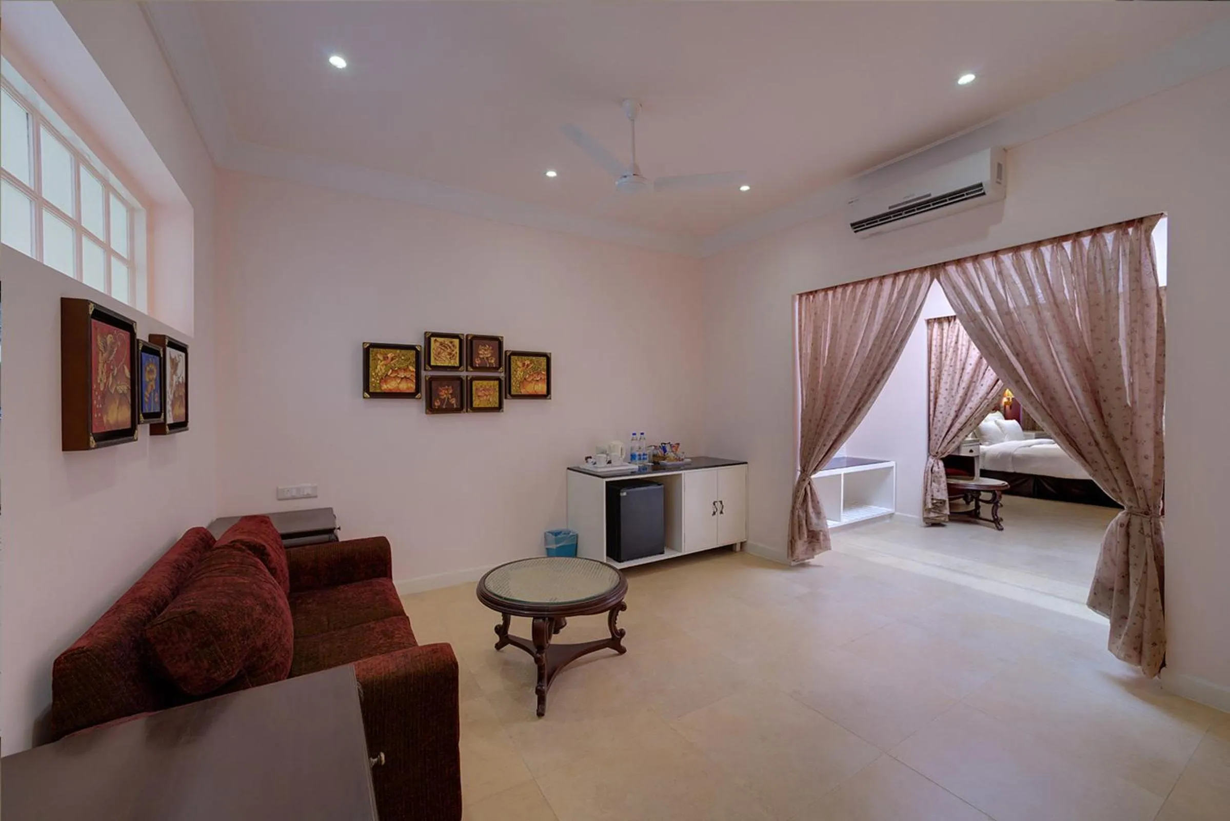 Living room, Bed in Mayfair Palm Beach Resort