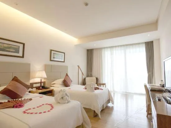 Bed in Mingshen Golf & Bay Resort Sanya