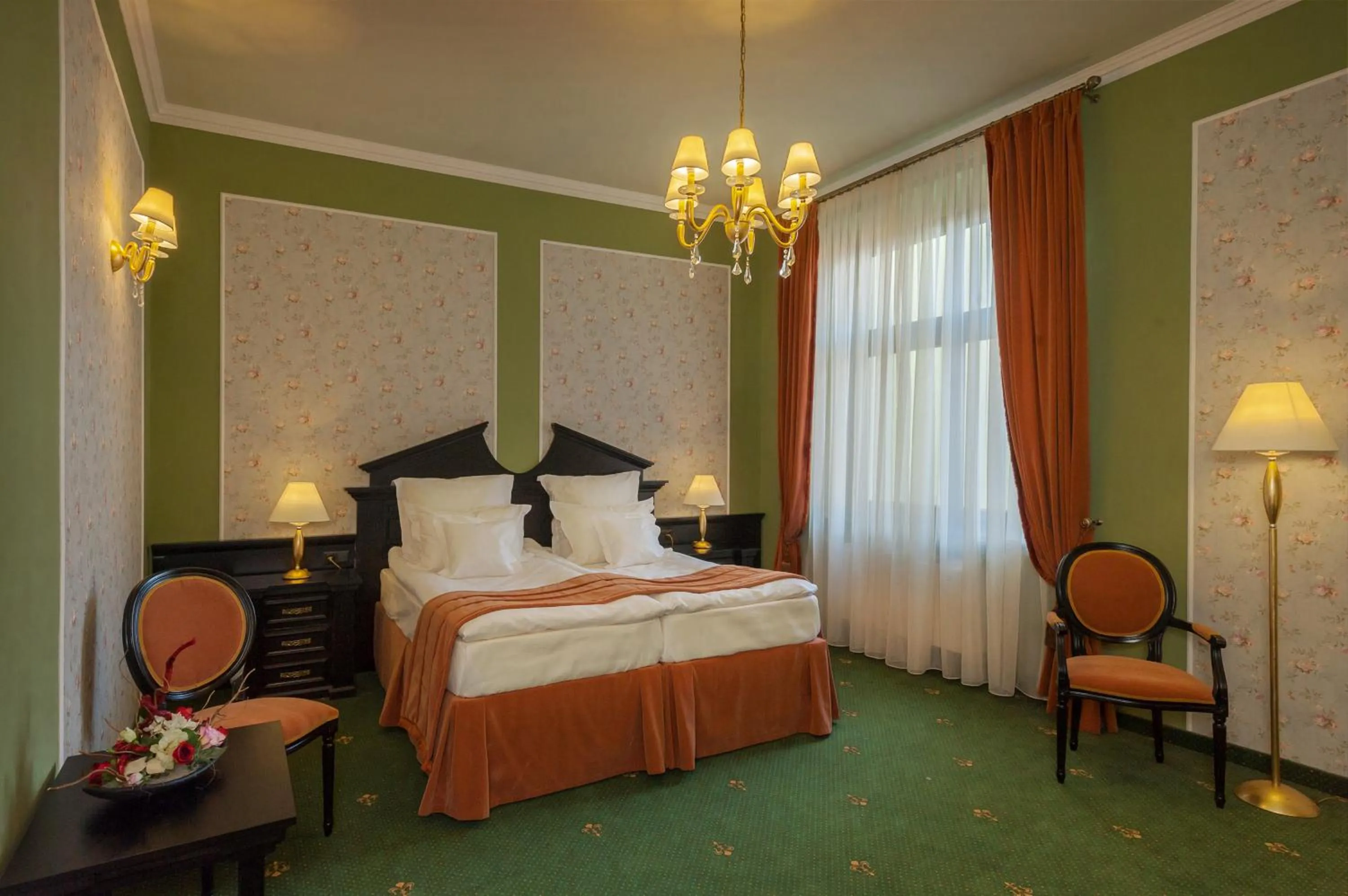 Bed in Hotel Central Park Sighisoara