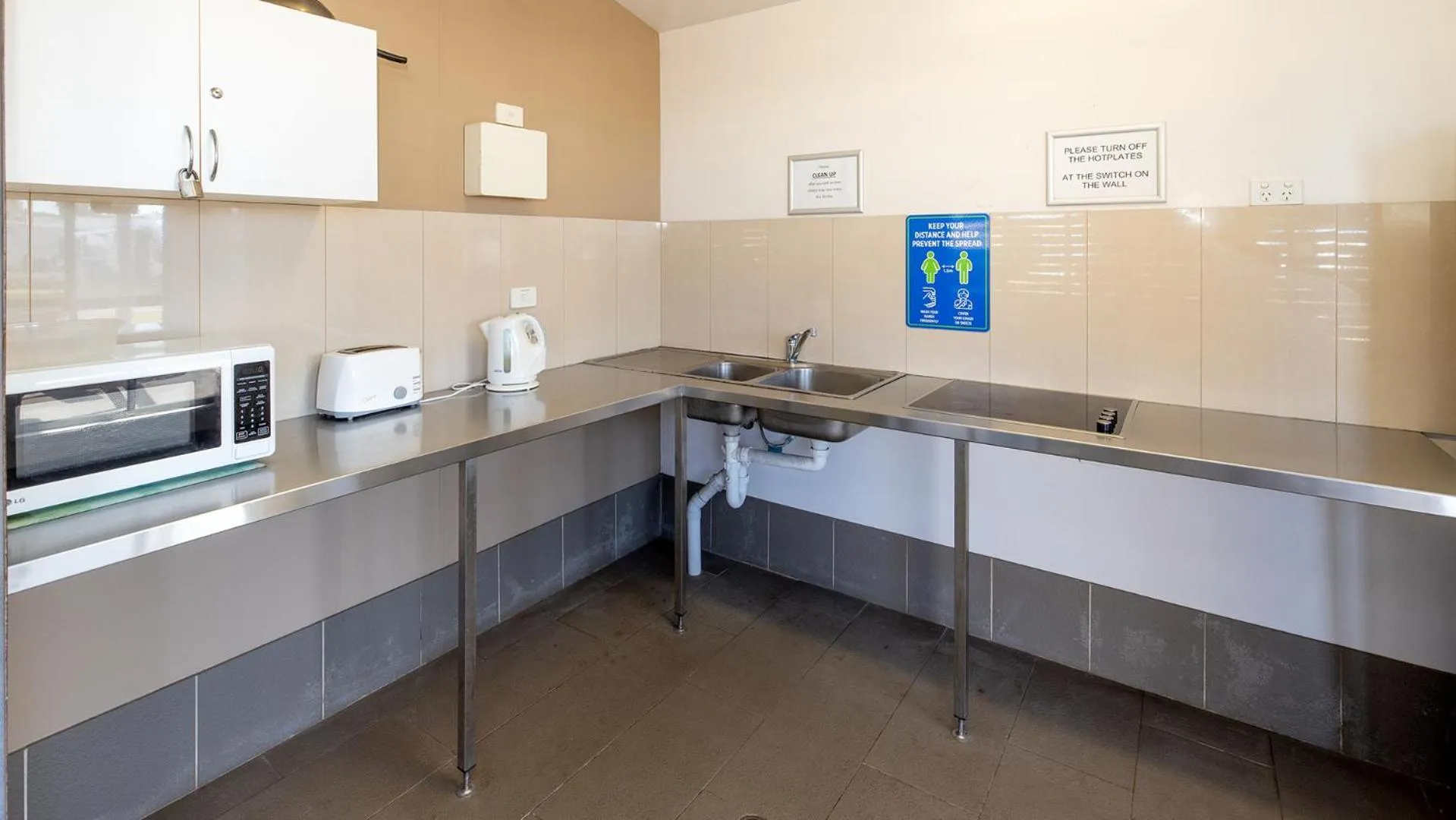 Kitchen or kitchenette in Woolgoolga Beach Holiday Park