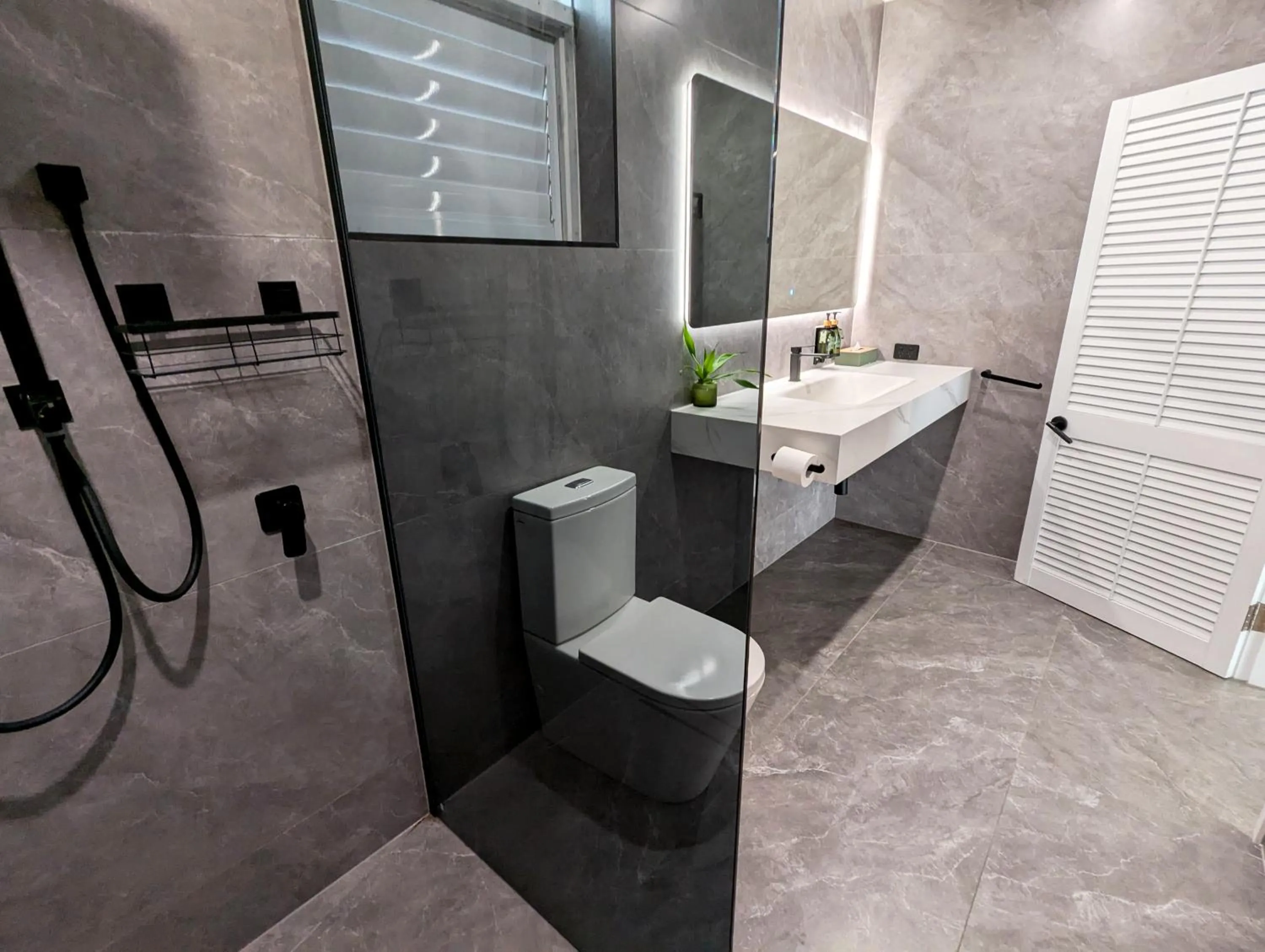 Bathroom in Ramada By Wyndham Cairns City Centre