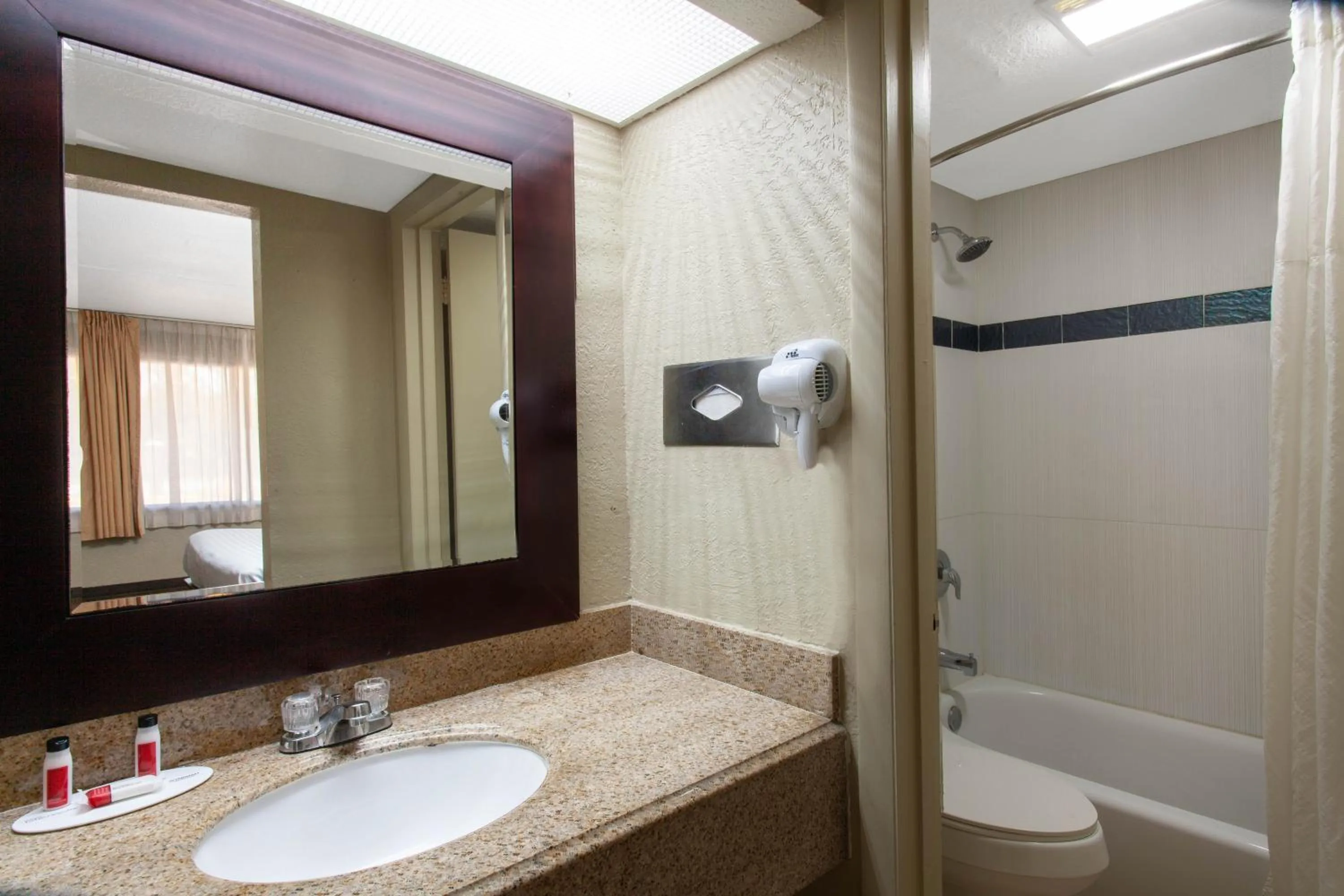 Bathroom in Travelodge by Wyndham Deltona