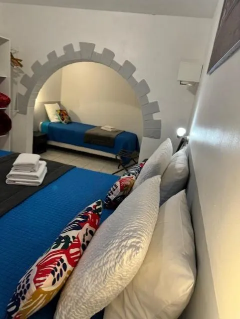 Bed in LOGIS Hôtel La Chaumière