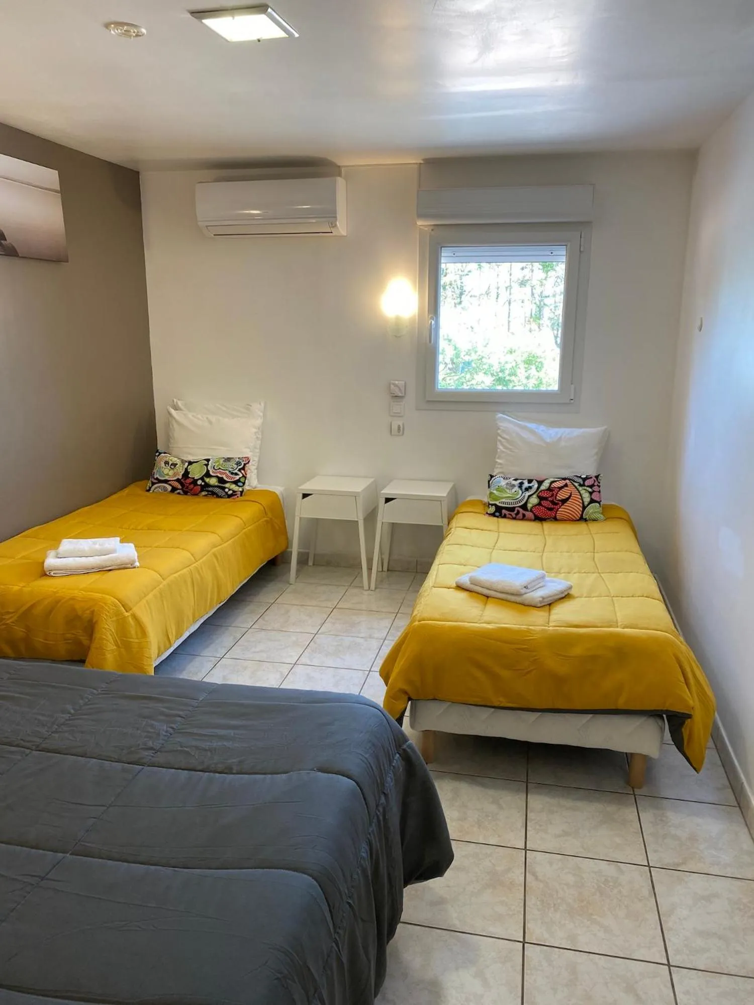 Bed in LOGIS Hôtel La Chaumière