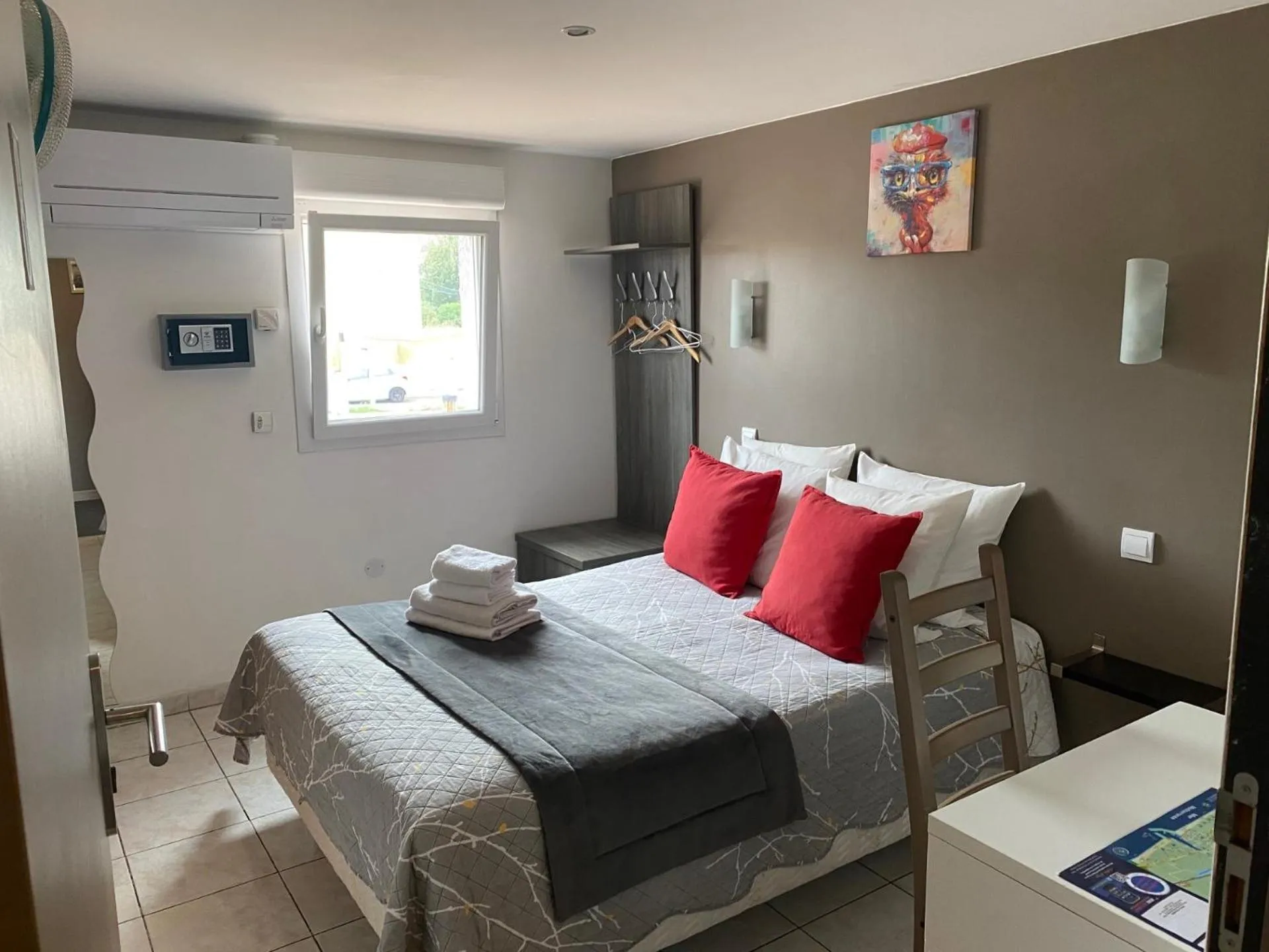 Bed in LOGIS Hôtel La Chaumière