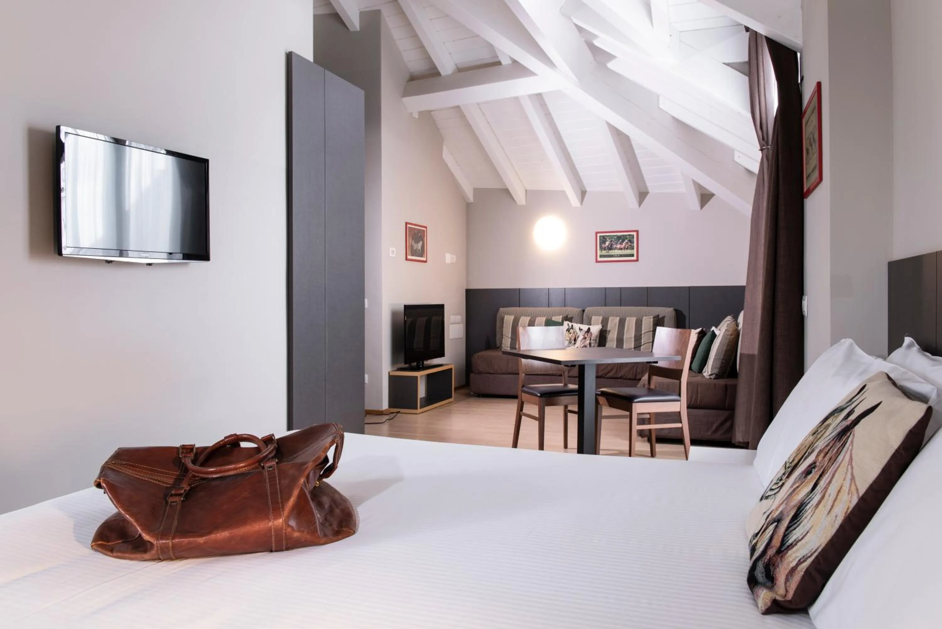 Living room, Bed in Hotel Osteria della Pista dal 1875