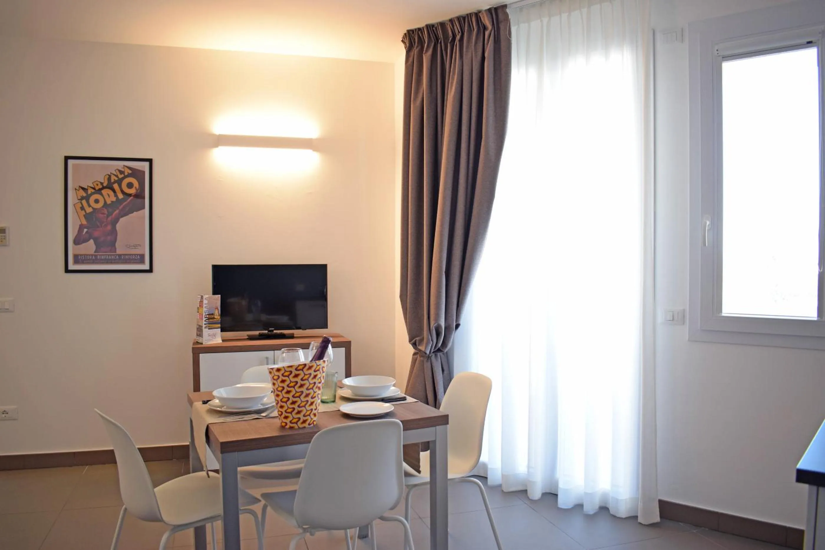 TV and multimedia in Travini Hotel Residence