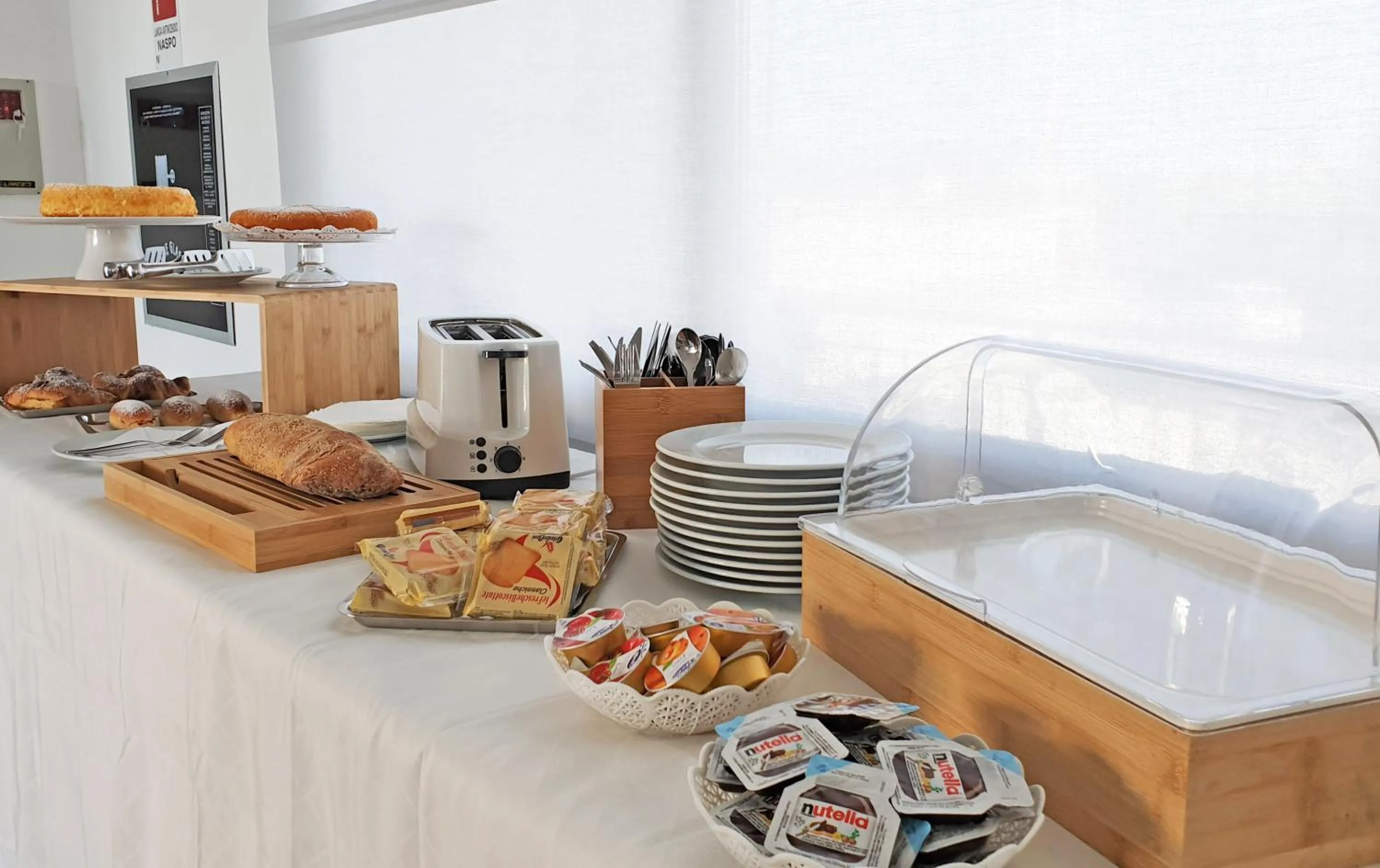 Buffet breakfast in Travini Hotel Residence
