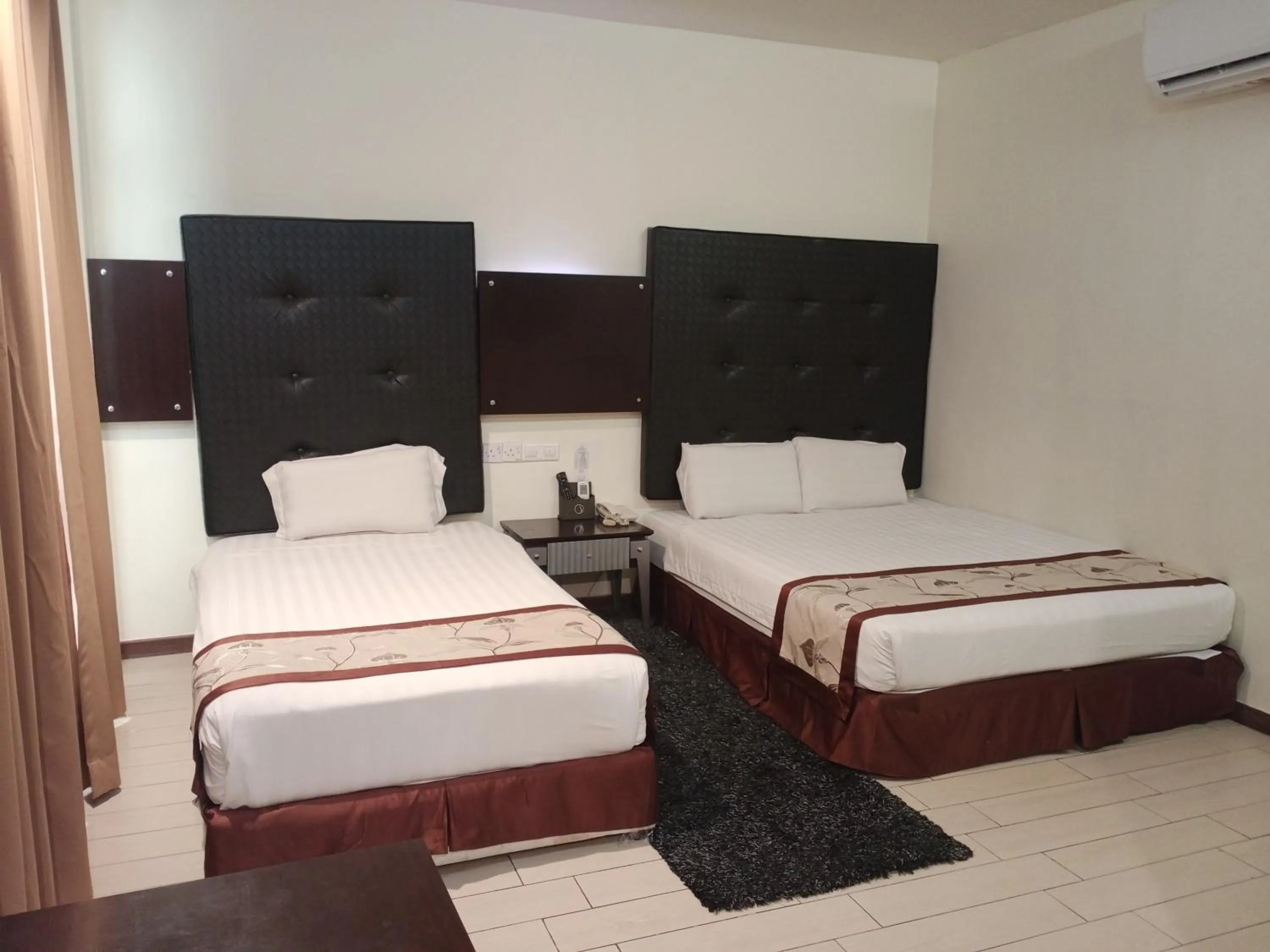 Bed in Shervinton Executive Boutique Hotel